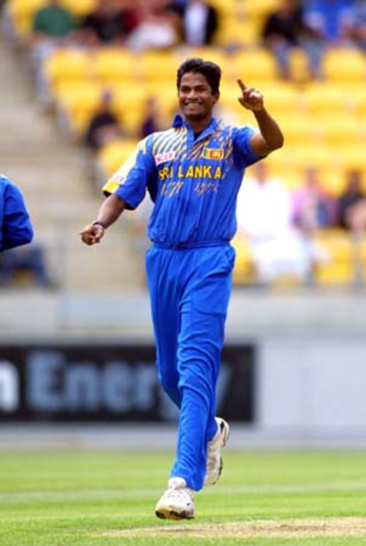 Sri Lankan opening bowler Nuwan Zoysa runs down the wicket to celebrate his second wicket, dismissing New Zealand batsman Stephen Fleming caught behind by wicket-keeper Kumar Sangakkara for a duck. 2nd One-Day International: New Zealand v Sri Lanka at WestpacTrust Stadium, Wellington, 3 February 2001.