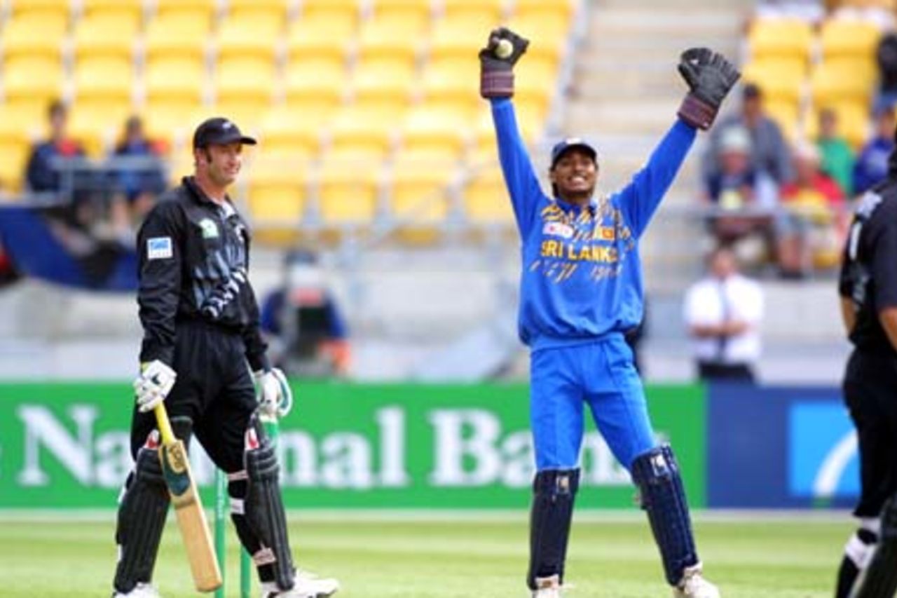 Sri Lankan wicket-keeper Kumar Sangakkara unsuccessfully appeals to umpire Steve Dunne for a catch behind the wicket of New Zealand batsman Chris Harris, on 41, off the bowling of Sanath Jayasuriya. Harris went on to score 56. 2nd One-Day International: New Zealand v Sri Lanka at WestpacTrust Stadium, Wellington, 3 February 2001.