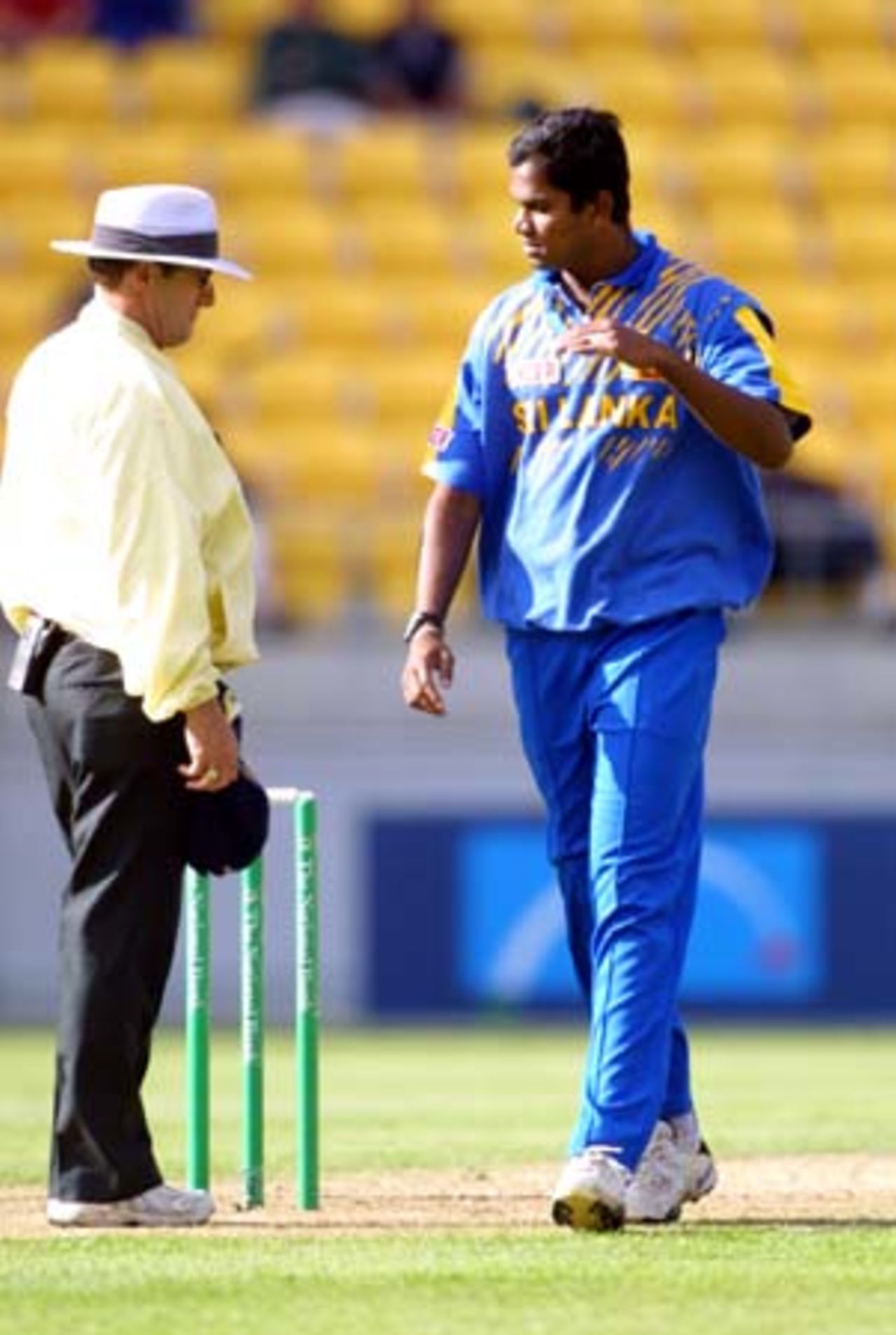 Sri Lankan left arm medium fast bowler Nuwan Zoysa questions umpire Dave Quested over the last ball of the New Zealand innings being called no-ball. Square leg umpire Steve Dunne indicated the short-pitched delivery to batsman Daniel Vettori passed above shoulder height to Quested, who made the no-ball call. 2nd One-Day International: New Zealand v Sri Lanka at WestpacTrust Stadium, Wellington, 3 February 2001.