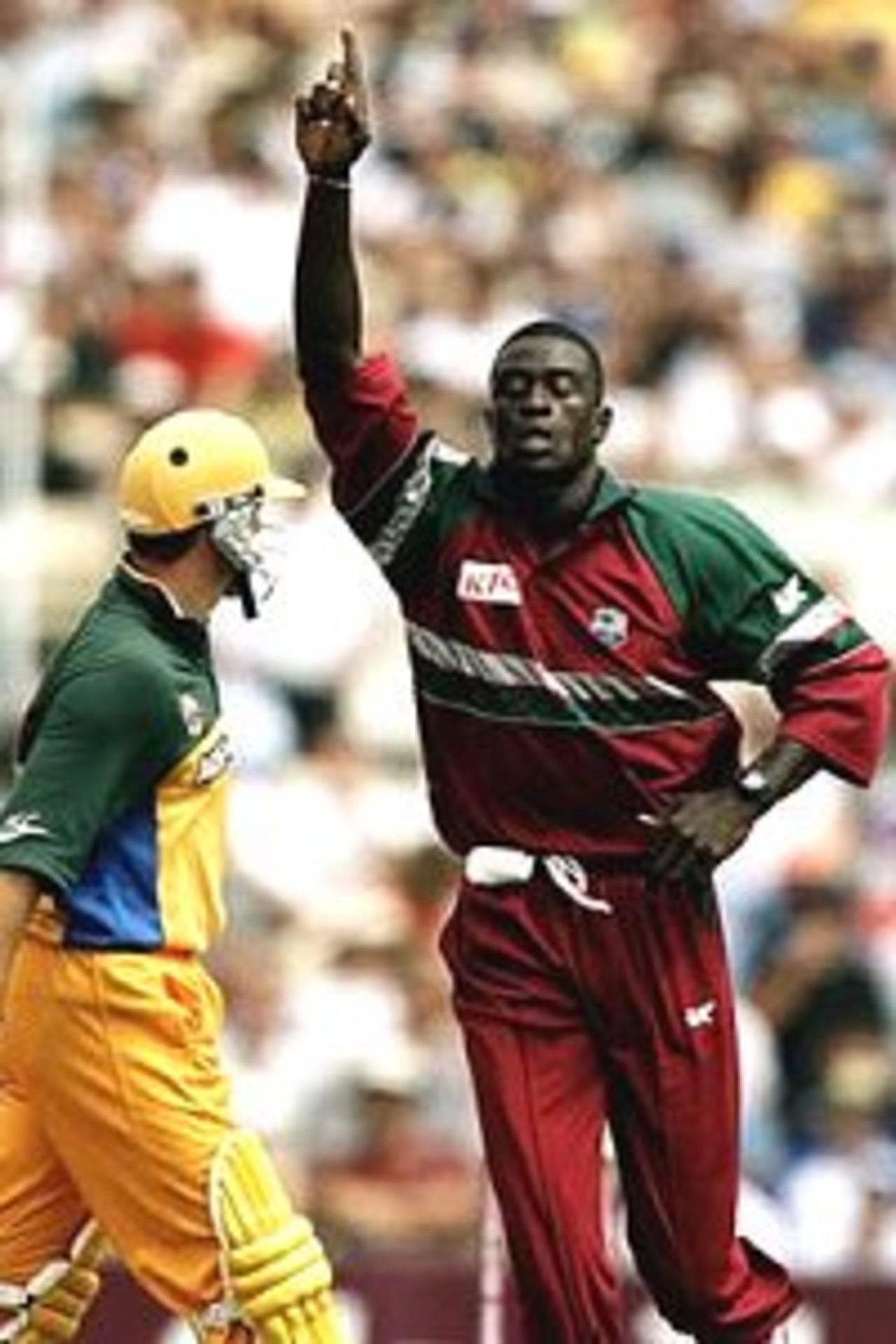 7 Feb 2001: Cameron Cuffy of West Indies celebrates the wicket of Mark Waugh of Australia caught by Brian Lara for ten during the first final of the Carlton Series One Day Internationals between Australia and West Indies at the Sydney Cricket Ground, Sydney, Australia.