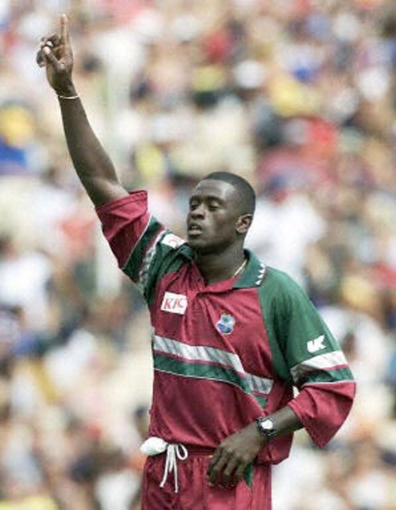 West Indies fast bowler Cameron Cuffy celebrates after taking the wicket of Mark Waugh for 10 runs during the first cricket final between Australia and the West Indies in Sydney 07 February 2001. The West Indies won the toss and put Australia in to bat, Waugh was caught by Brian Lara.