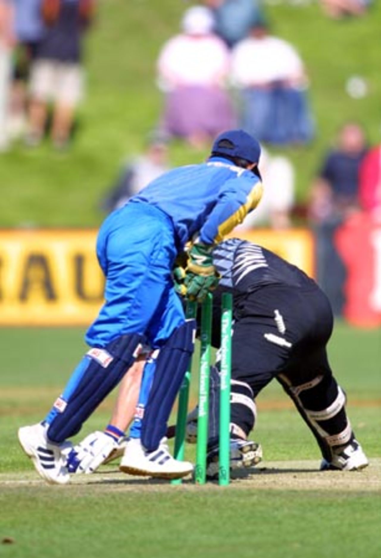 New Zealand batsman Roger Twose unsuccessfully attempts to stretch the back foot back inside the crease as he is stumped by Sri Lankan wicket-keeper Romesh Kaluwitharana off the bowling of off spinner Mutiah Muralitharan for 20. 4th One-Day International: New Zealand v Sri Lanka at WestpacTrust Park, Hamilton, 8 February 2001.