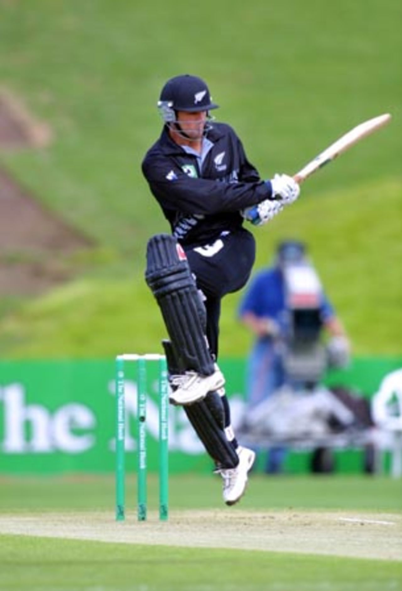 New Zealand opening batsman Nathan Astle jumps to pull a ball down through square leg during his innings of seven. 4th One-Day International: New Zealand v Sri Lanka at WestpacTrust Park, Hamilton, 8 February 2001.