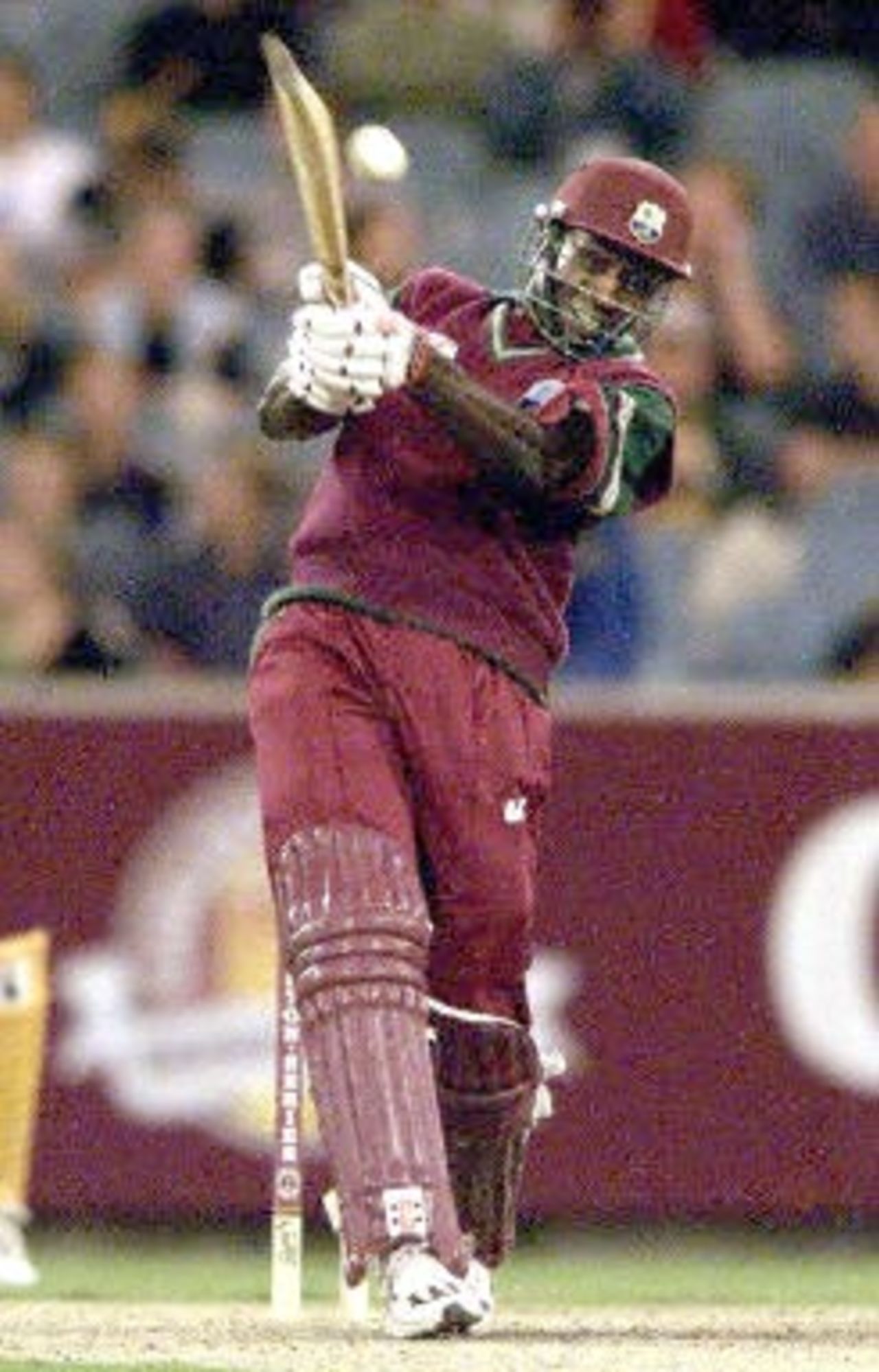 West Indian batsman Wavell Hinds hits out against the Australian bowling during the 2nd one-day final against the West Indies at the MCG in Melbourne 09 February 2001. Australia amassed the huge total of 338-6 with Mark Waugh topscoring with 173 and in reply the West Indies are 250-7 after 40 overs.