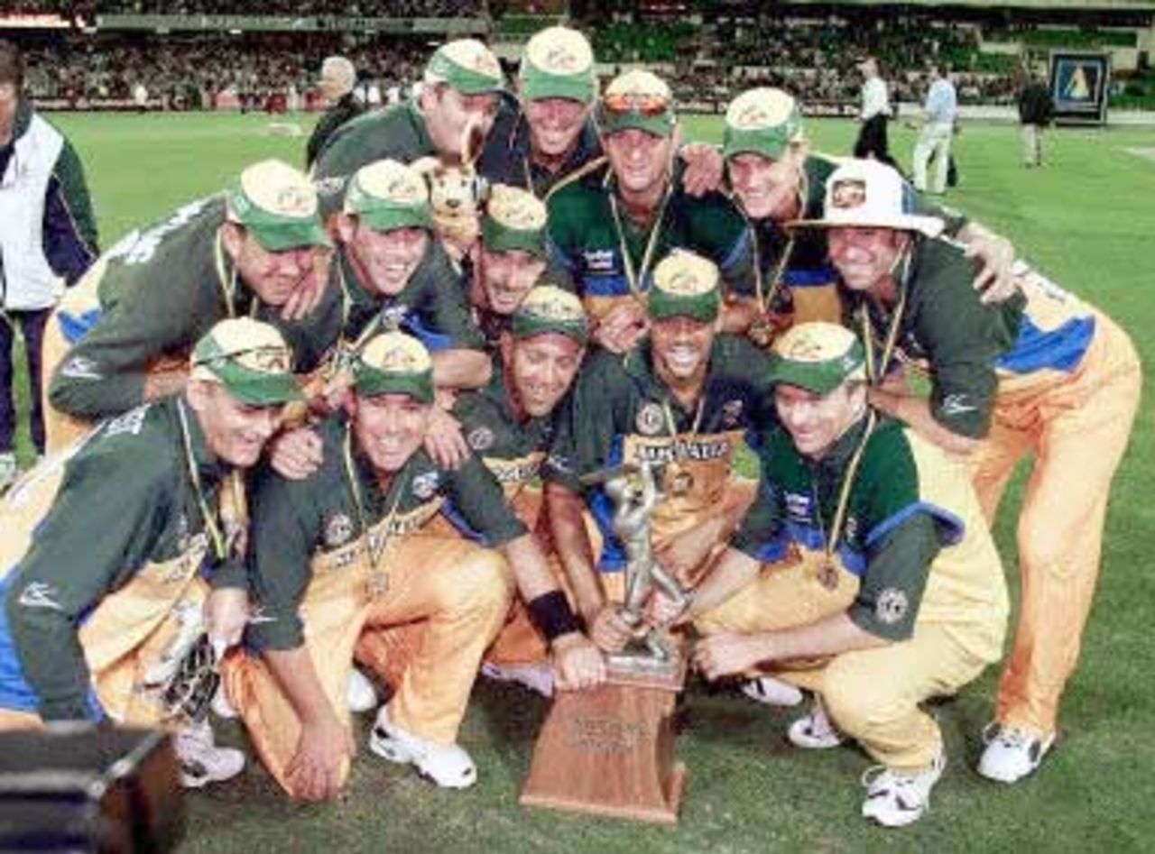 The Australian team celebrates with the trophy after winning the 2nd one-day final against the West Indies to take out the series 2-0 at the MCG in Melbourne 09 February 2001. Australia amassed the huge total of 338-6 with Mark Waugh topscoring with 173 and in reply the West Indies scored 299 to lose by 39 runs.