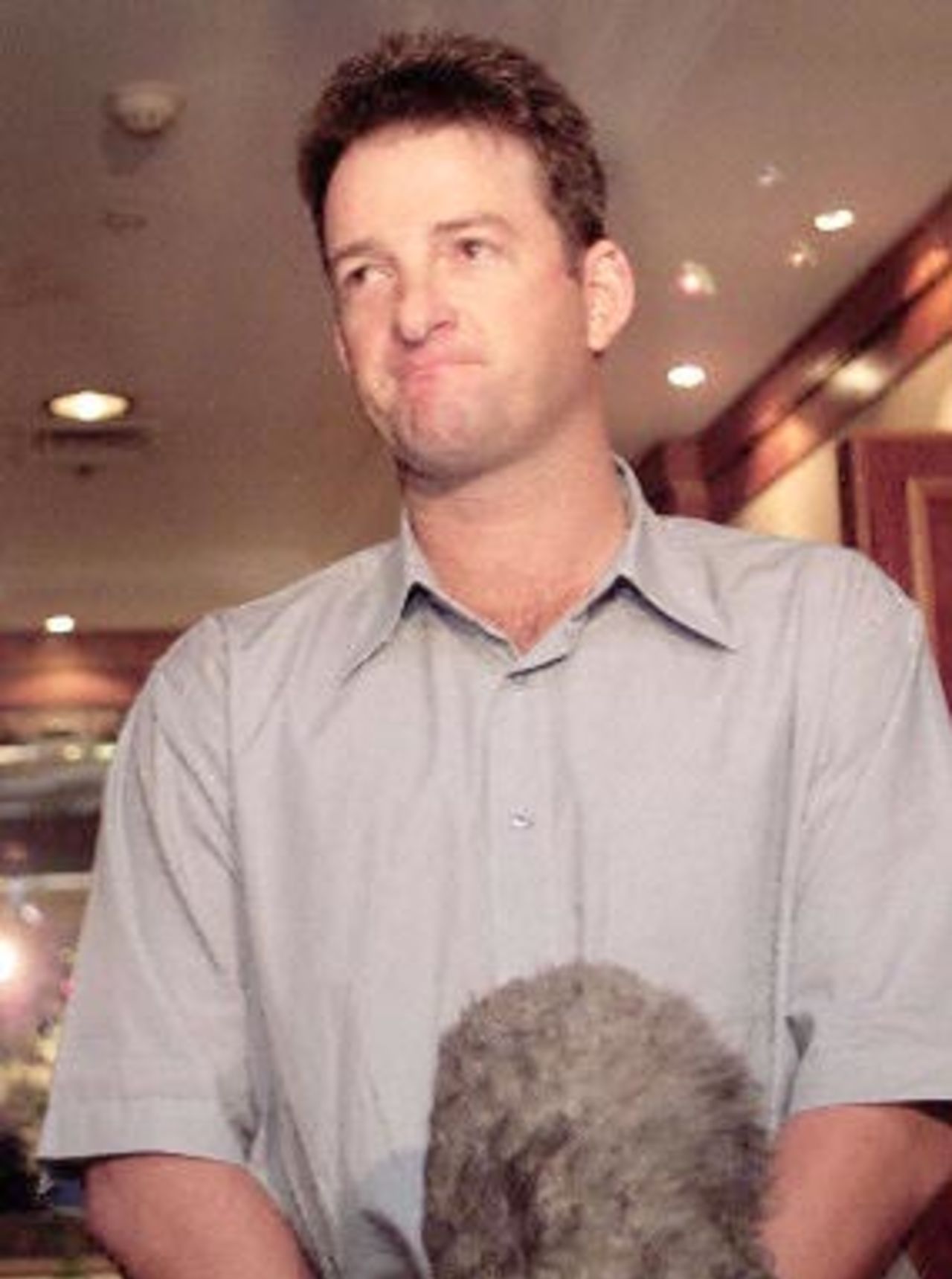 Australian cricket batsman Mark Waugh is tight-lipped as he talks to the media after meeting with the Australian Cricket Board (ACB) and the International Cricket Council (ICC) anti-corruption unit at an inner-city hotel in Melbourne 10 February 2001. Waugh is facing allegations of receiving large amounts of cash from a Indian bookmaker in exchange for team information.