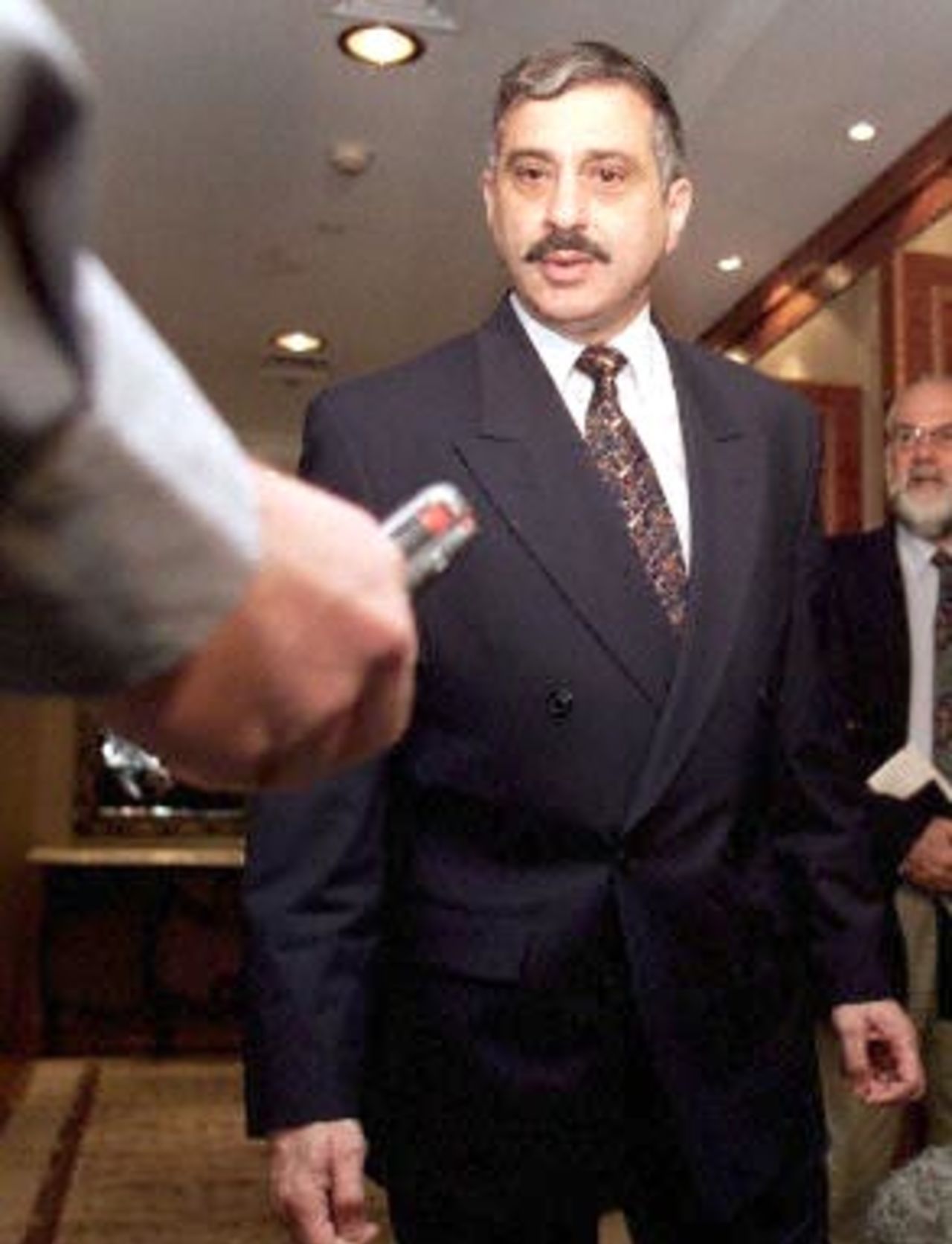 Australian Cricket Board (ACB) anti-corruption investigator Greg Melick speaks to the press after interviewing Australian batsman Mark Waugh at an inner-city hotel in Melbourne 10 February 2001. Waugh is facing allegations of receiving large amounts of cash from a Indian bookmaker in exchange for team information.