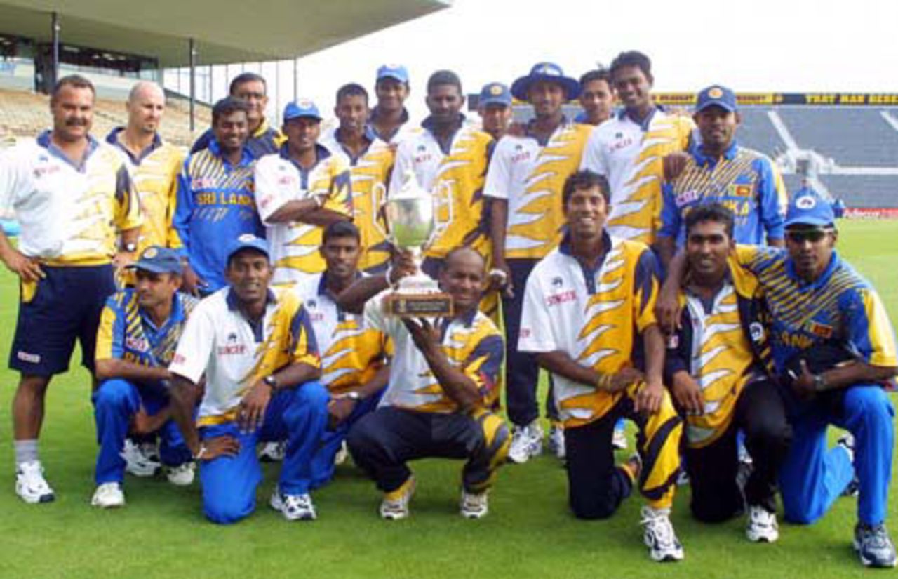 The Sri Lankan team gather for a team picture after winning the National Bank One-Day International series 4-1. Captain Sanath Jayasuriya holds up the National Bank Trophy. 5th One-Day International: New Zealand v Sri Lanka at Jade Stadium, Christchurch, 11 February 2001.