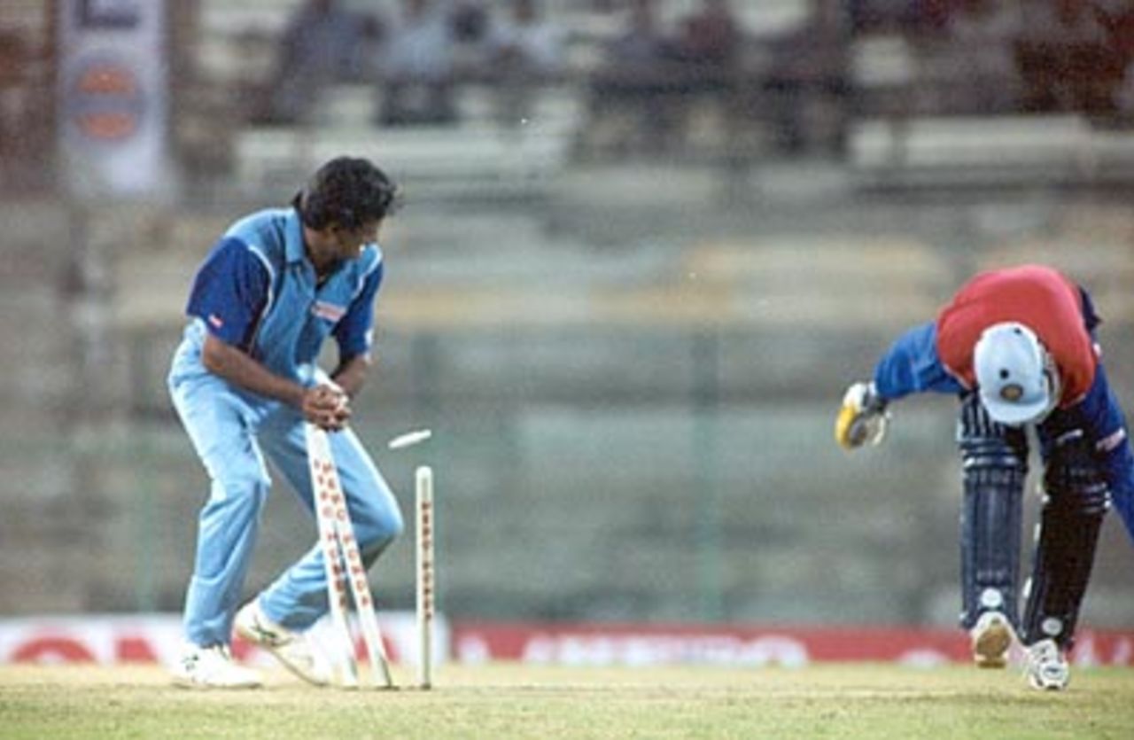 Chopra is caught short of his crease as Srinath breaks the stumps. Challenger Series 2000/01, India v India 'B' at MA Chidambaram Stadium, Chepauk, Chennai, 13 Feb 2001