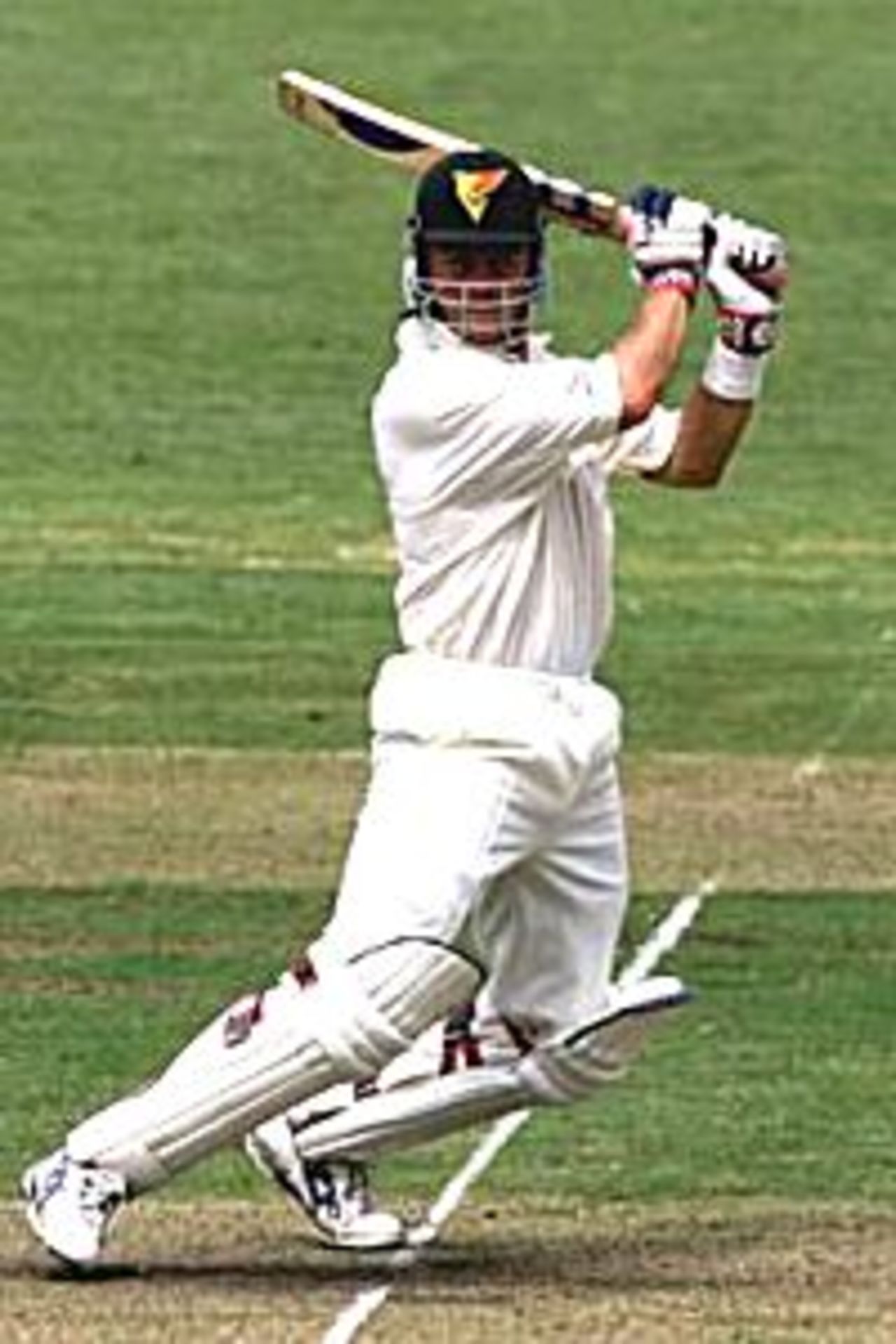 Feb 14th 2001 :Jamie Cox of Tasmania smashes a four on his way to a hundred