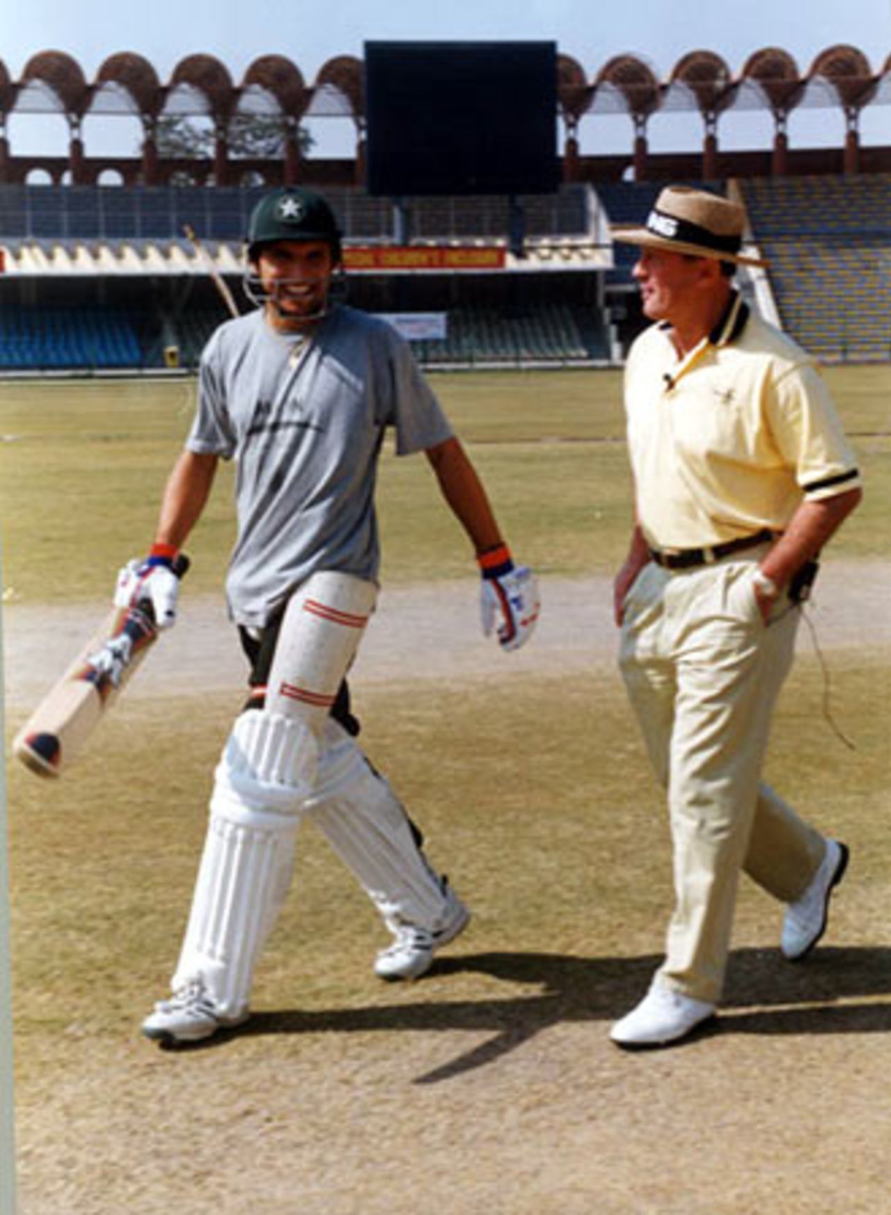 Geoff Boycott and Shahid Afridi share a lighter moment, Gaddafi Stadium Lahore, during the Feb 2001 coaching session