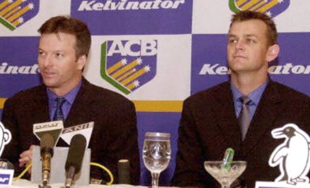Steve Waugh (L) Australian captain and Adam Gilcrist vice-captain reply to questions during a press conference, 14 February 2001 on their arrival in Bombay for a series of matches to be played with India across the country. Australia will play three Test matches and five one day internationals during the cricket series.