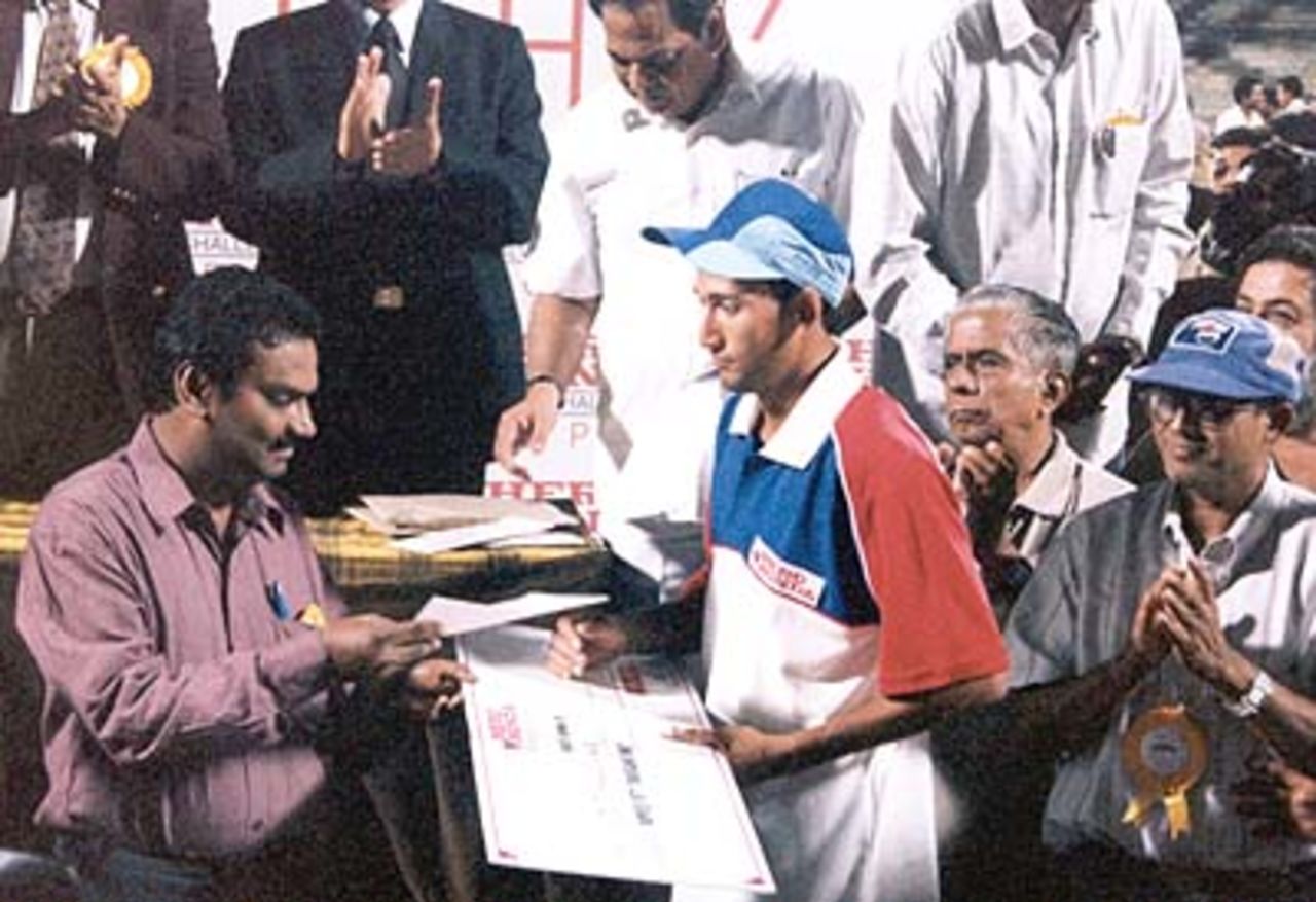 Ajit Agarkar in custody of his Best Bowler cheque. Challenger Series 2000/01, Final, India v India 'A', MA Chidambaram Stadium, Chepauk, Chennai, 15 Feb 2001