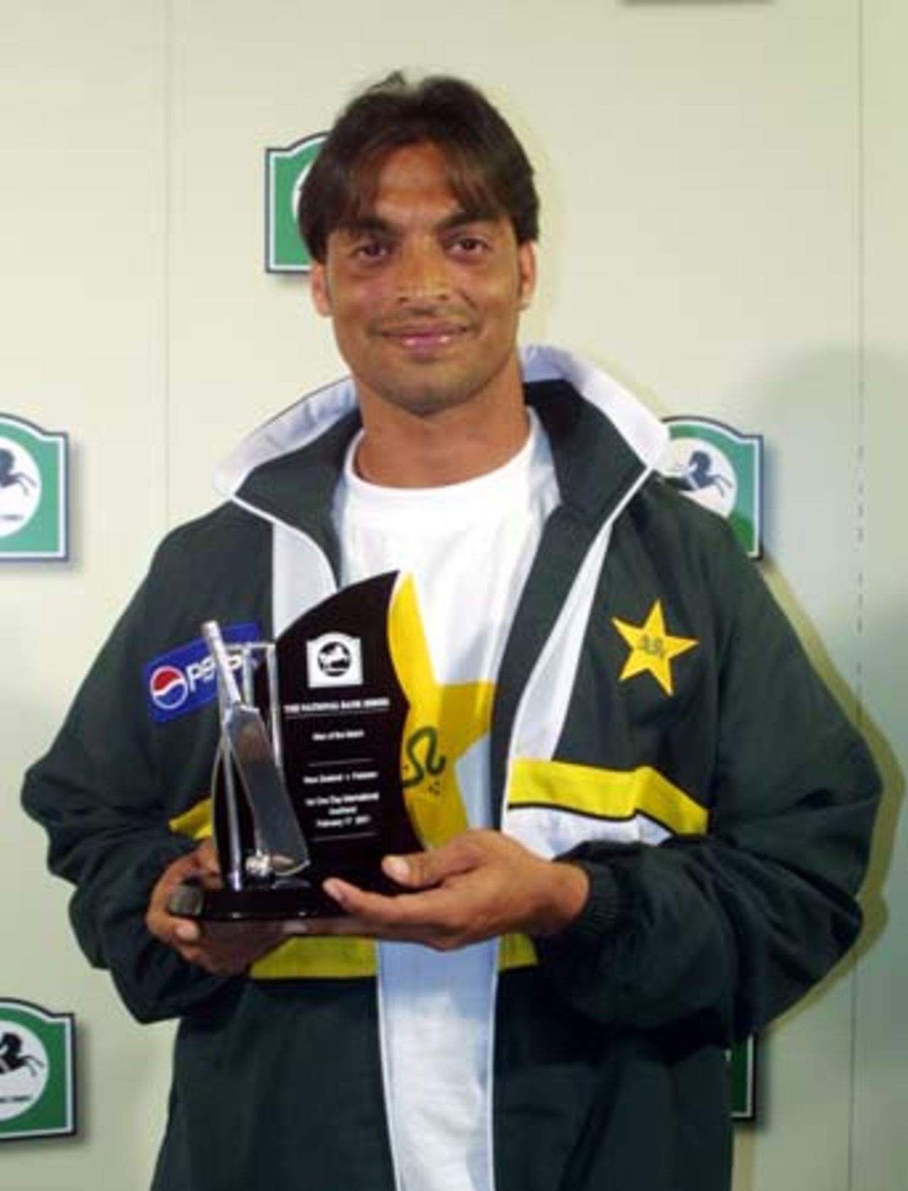 Pakistan fast bowler Shoaib Akhtar holds the National Bank Player of the Match trophy for taking 5-19 from 6.3 overs, his first five-wicket bag in One-Day Internationals. 1st One-Day International: New Zealand v Pakistan at Eden Park, Auckland, 18 February 2001.