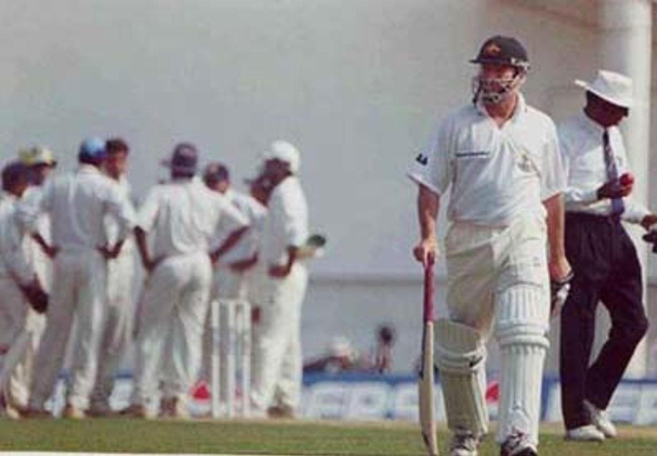 Steve Waugh makes the long walk back, falling to Nehra for a duck, Australia in India 2000/01, India 'A' v Australia, Vidarbha C.A. Ground, Nagpur, 17-19 Feb 2001 (Day 1)