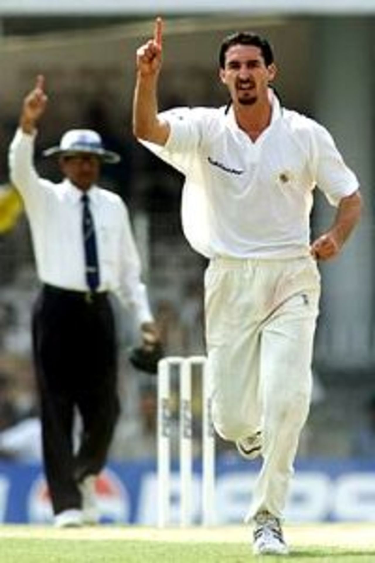 18 Feb 2001: Jason Gillespie of Australia celebrates after taking the wicket of Sadagoppan Ramesh of India A, during day two of the three day tour match between India A and Australia played at Vidarbha Cricket Association Stadium, Nagpur, India.