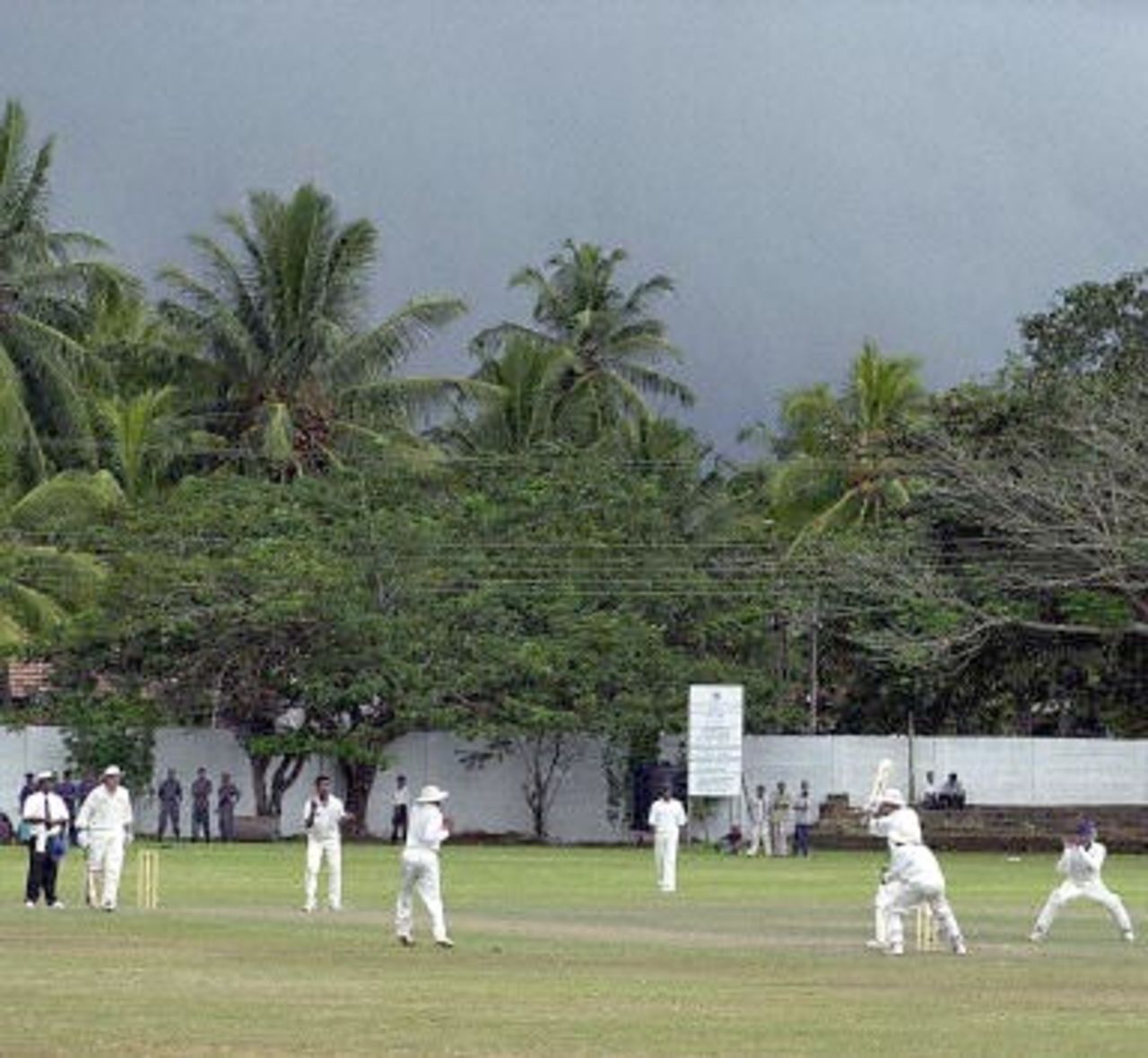 The sky line indicates the impending rain which stopped the game on the second day of England's four-day match against a Board President's XI at Matara in Southern Sri Lanka 16 February 2001. England replying to the Board President's XI total of 253 were 173 for two wickets when the weather intervened.