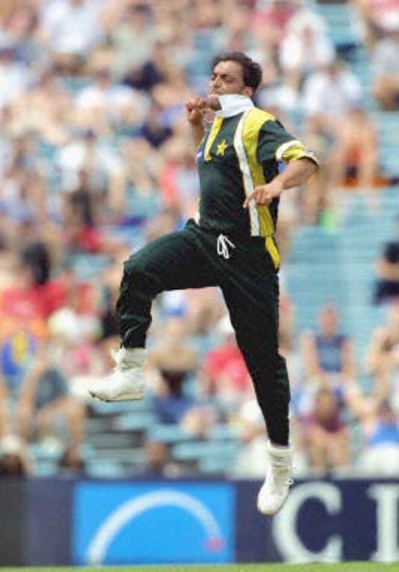 Pakistani pace bowler Shoaib Akhtar leaps into the air after bowling New Zealand's Daniel Vettori for a duck during their opening one day international at Eden Park in Auckland, 18 February 2001. Akhtar destroyed the New Zealand innings with bowling figures of five for 19, including four wickets in six balls.