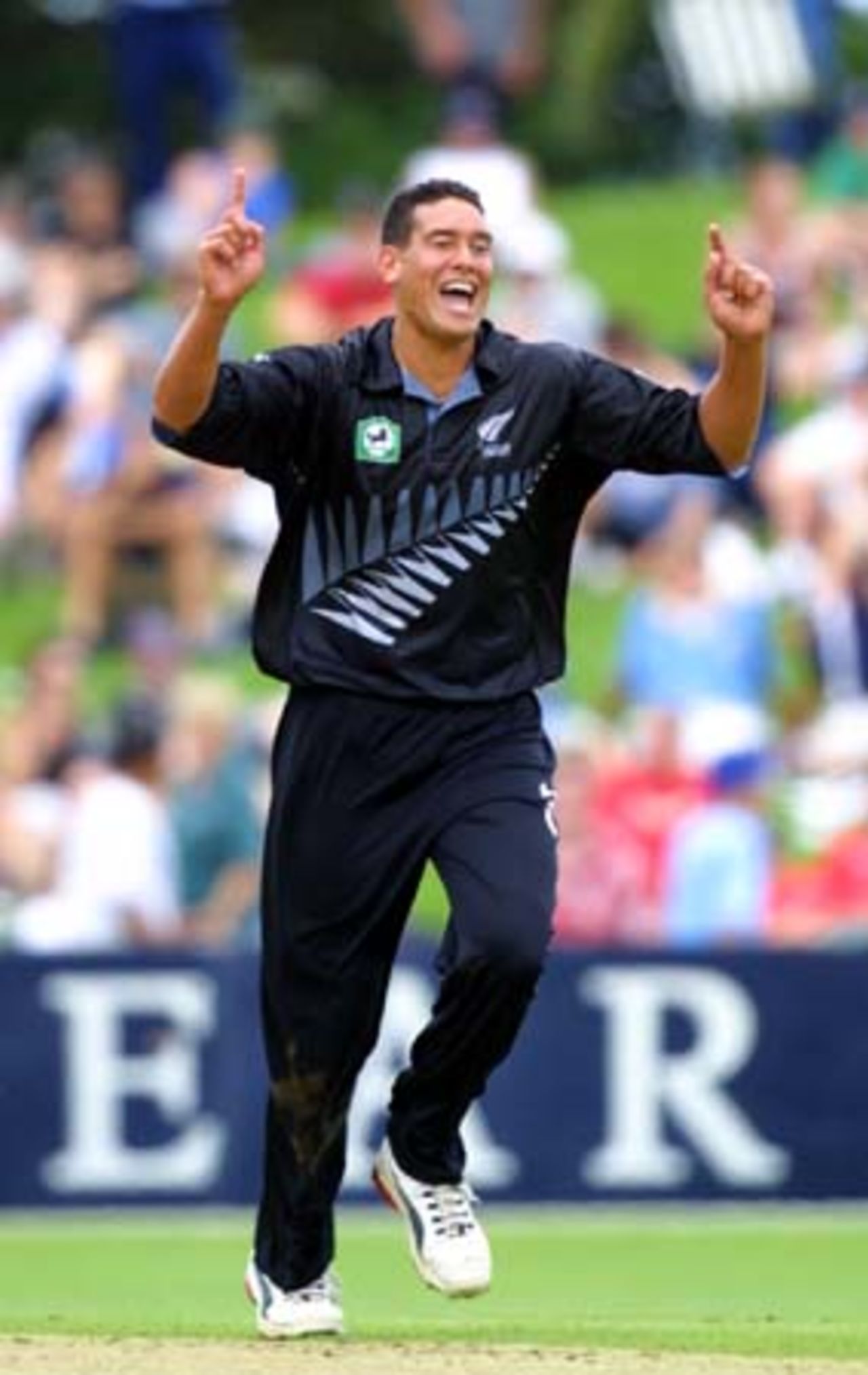 New Zealand fast medium bowler Daryl Tuffey celebrates the dismissal of Pakistan wicket-keeper/batsman Moin Khan, caught at slip by Stephen Fleming for one. 2nd One-Day International: New Zealand v Pakistan at McLean Park, Napier, 20 February 2001.