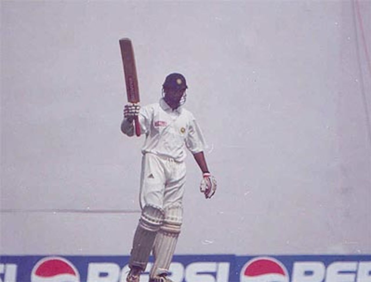 Ramesh holds his bat aloft to acknowledge the crowd's cheers, Australia in India, 2000/01, India 'A' v Australians, Vidarbha C.A. Ground, Nagpur, 17-19 February 2001 (Day 2).