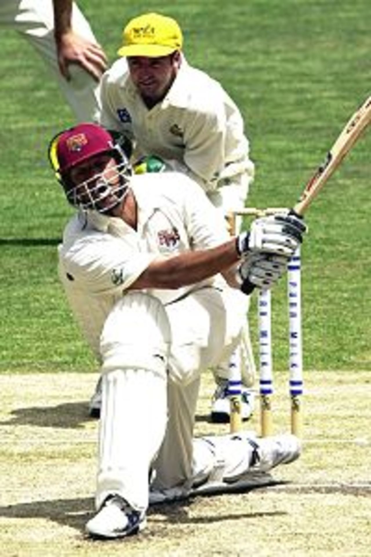 20 Feb 2001: Andrew Symonds of Queensland in action hitting a six against Western Australia during the Pura Cup cricket match played at the Gabba in Brisbane, Australia.
