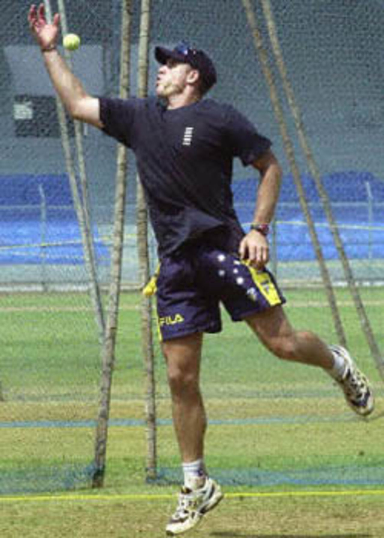 Australian cricketer Mathew Hayden leaps for a catch during practice at the nets, 21 February 2001, at the Brabourne stadium in Bombay. Australia will play the Bombay Champions in a three day warm-up match on February 22.