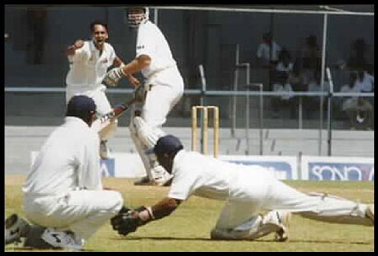 Dighe lunges to take a brilliant catch off Gilchrist, Australia in India 2000/01, Mumbai v Australians, Brabourne Stadium, Mumbai, 22-24 Feb 2001 (Day 2)