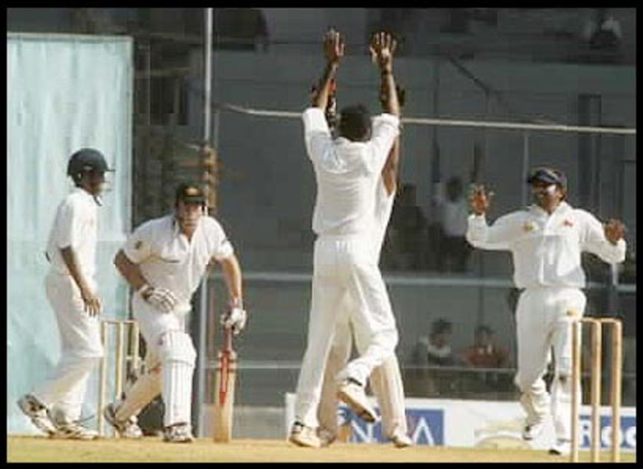 Kulkarni high-fives with Dighe after trapping Hayden in front, Australia in India 2000/01, Mumbai v Australians, Brabourne Stadium, Mumbai, 22-24 Feb 2001 (Day 2)