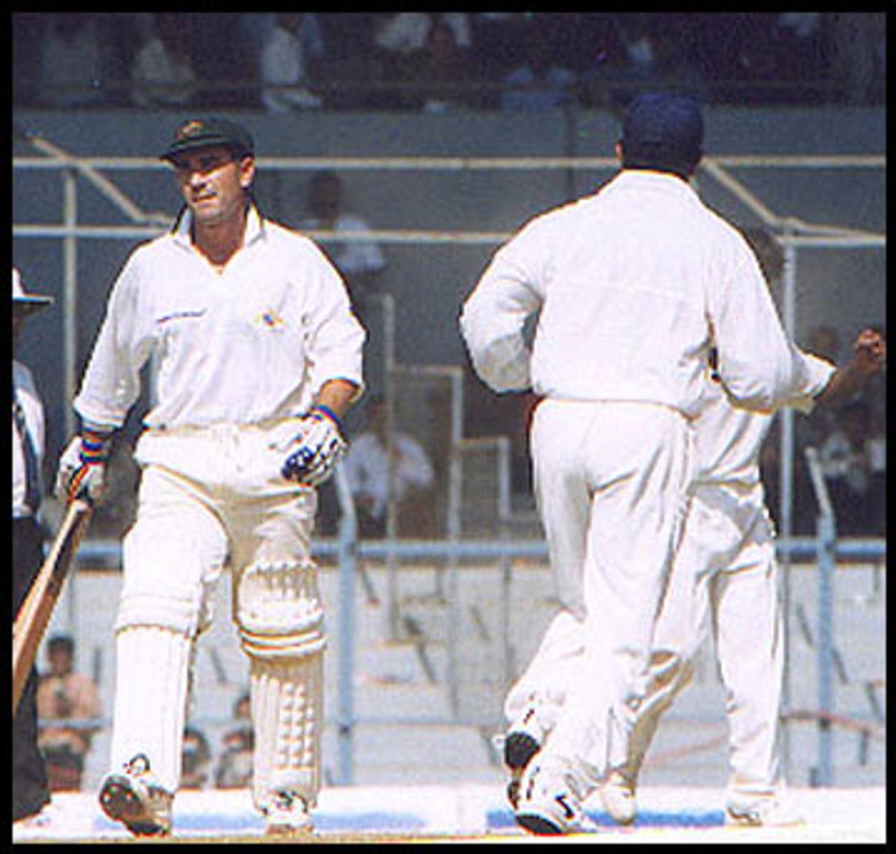 A dejected Langer departs after being caught by Mane off Bahutule. Australia in India 2000/01, Mumbai v Australians, Brabourne Stadium, Mumbai, 22-24 Feb 2001 (Day 3).