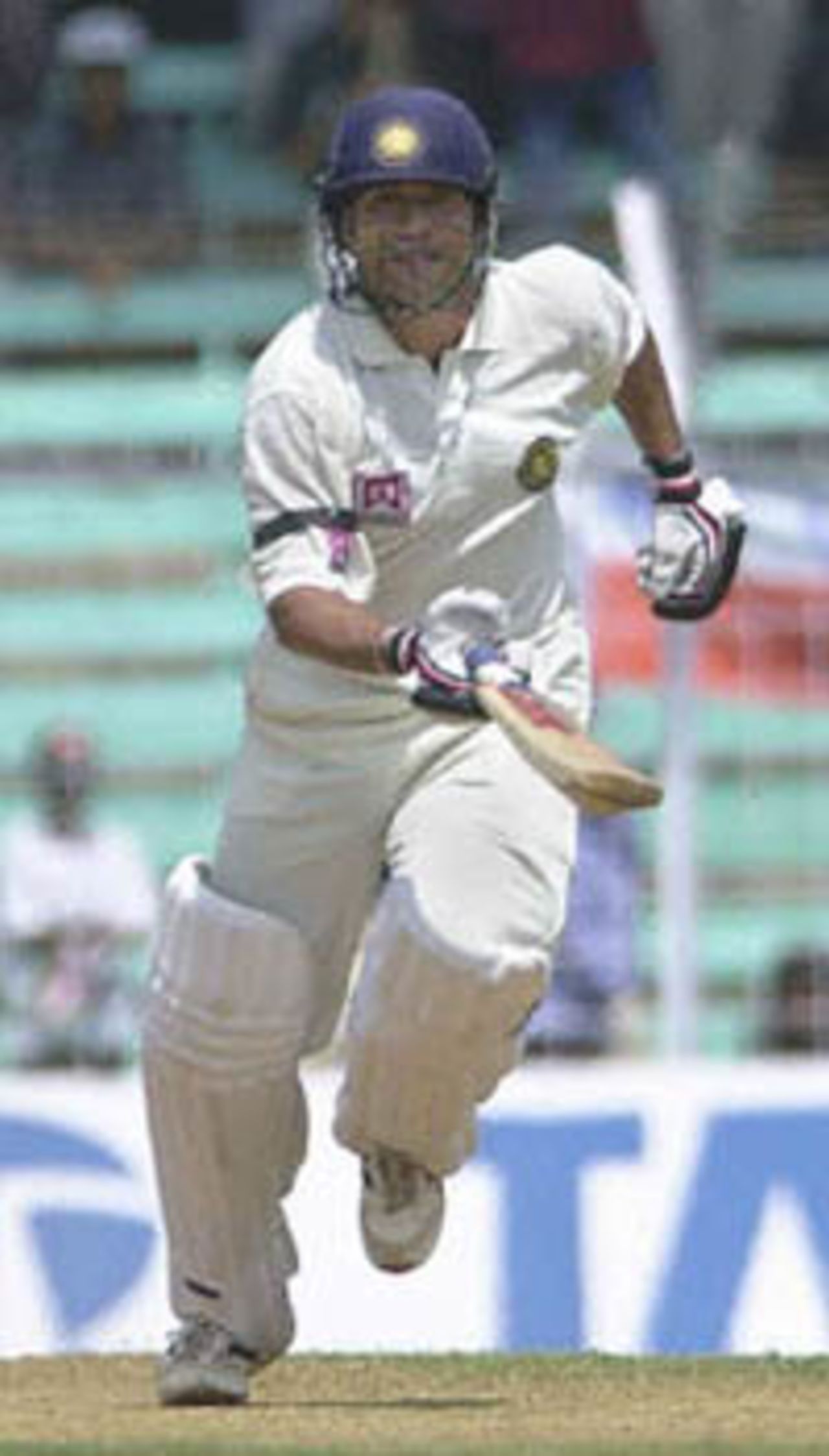 Indian batsman Sachin Tendulkar takes a run on his way to scoring 76 runs on the first day of the first test match between India and Australia in Wankhade stadium in Bombay 27 February 2001. Despite Tedulkar's effort India were struggling at 165 for 8 after tea.
