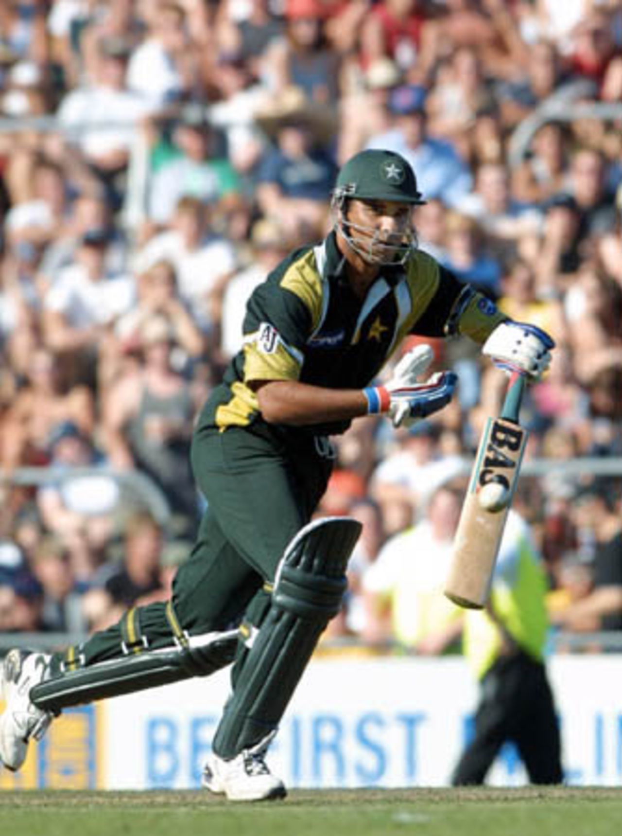 Pakistan lower order batsman Waqar Younis pushes a ball into the off side during his innings of two. 5th One-Day International: New Zealand v Pakistan, Carisbrook, Dunedin, 28 February 2001.