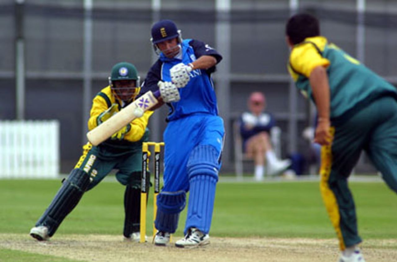 England Under-19 batsman Kadeer Ali shapes to play a short delivery during his innings of 44. Wicket-keeper Zwelibanzi Homani looks on. ICC Under-19 World Cup Super League Group 2: England Under-19s v South Africa Under-19s at Lincoln Green, Lincoln, 1 February 2002.