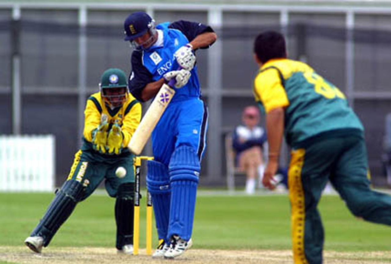 England Under-19 batsman Kadeer Ali defends a delivery during his innings of 44. Wicket-keeper Zwelibanzi Homani looks on. ICC Under-19 World Cup Super League Group 2: England Under-19s v South Africa Under-19s at Lincoln Green, Lincoln, 1 February 2002.