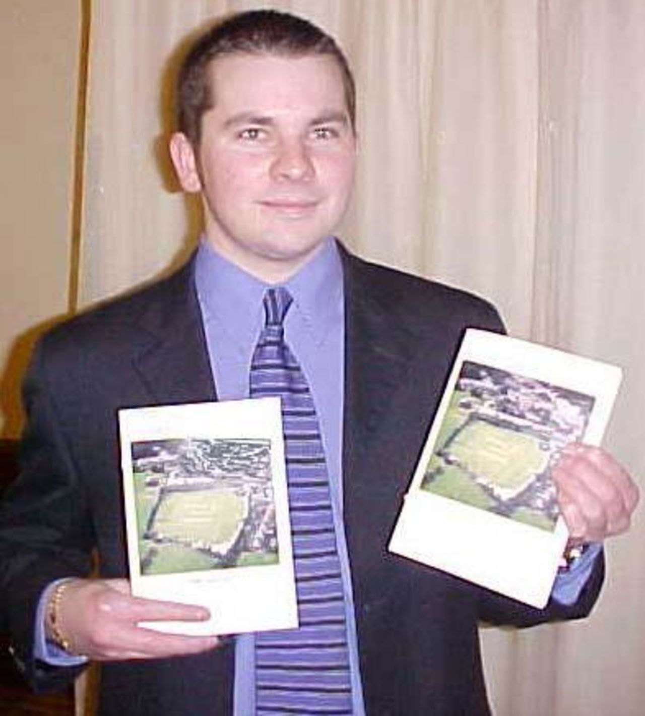 Ian Bailey with Edenfield's Centenary Brochure
