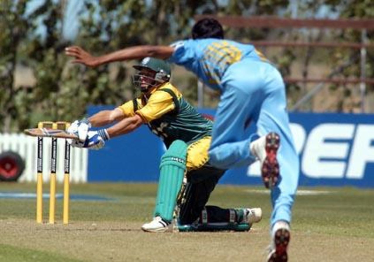 South Africa Under-19 batsman Davy Jacobs gives himself room to play an unorthodox square cut during his innings of 69 not out. 1st ICC Under-19 World Cup Super League Semi Final: India Under-19s v South Africa Under-19s at Bert Sutcliffe Oval, Lincoln, 3 February 2002.
