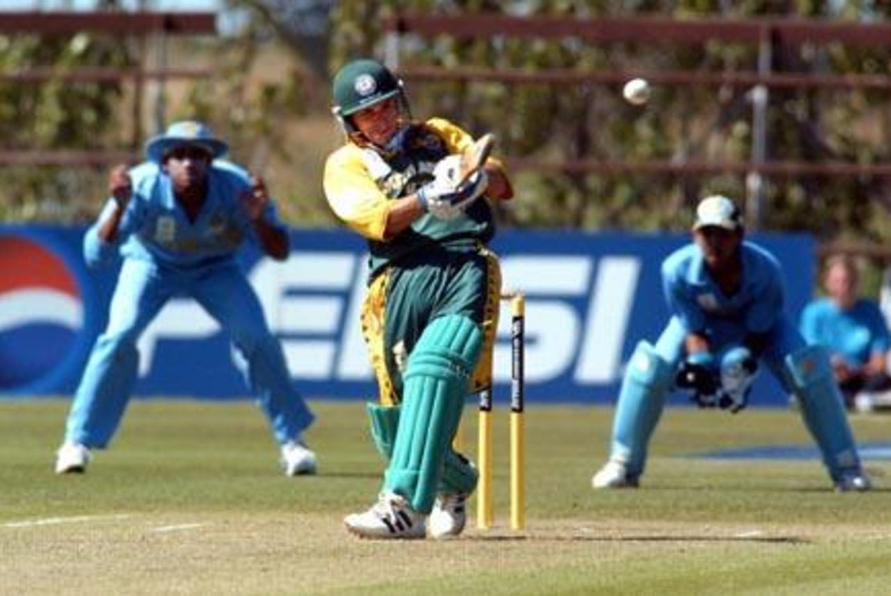 South Africa Under-19 batsman Chad Baxter pulls a delivery from India Under-19 bowler Irfan Pathan through midwicket during his innings of 22. 1st ICC Under-19 World Cup Super League Semi Final: India Under-19s v South Africa Under-19s at Bert Sutcliffe Oval, Lincoln, 3 February 2002.