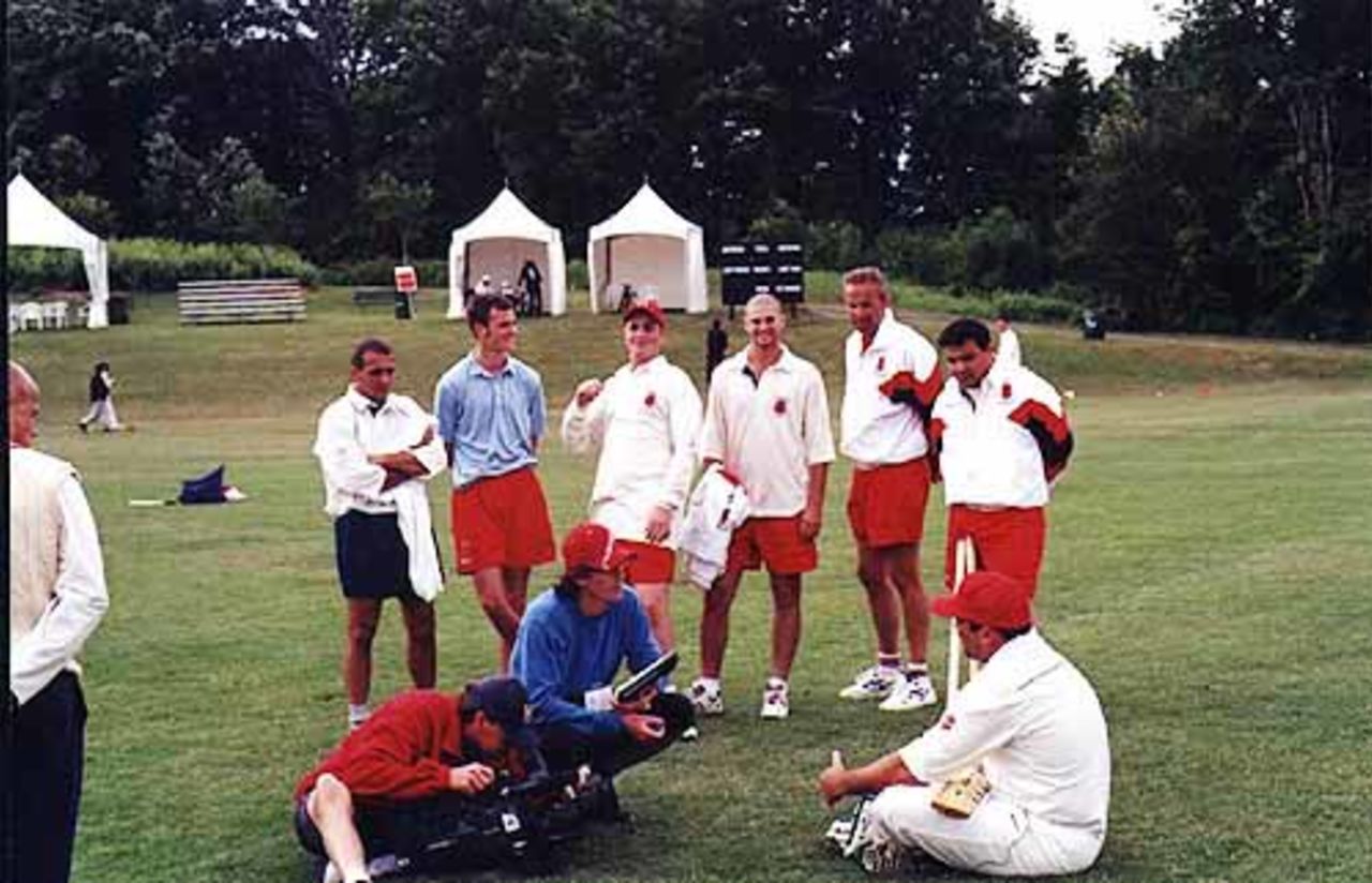 GCA captain, Christian Rocca, (sitting on the ground) being interviewed in Toronto (ICC Trophy) for the ECC video