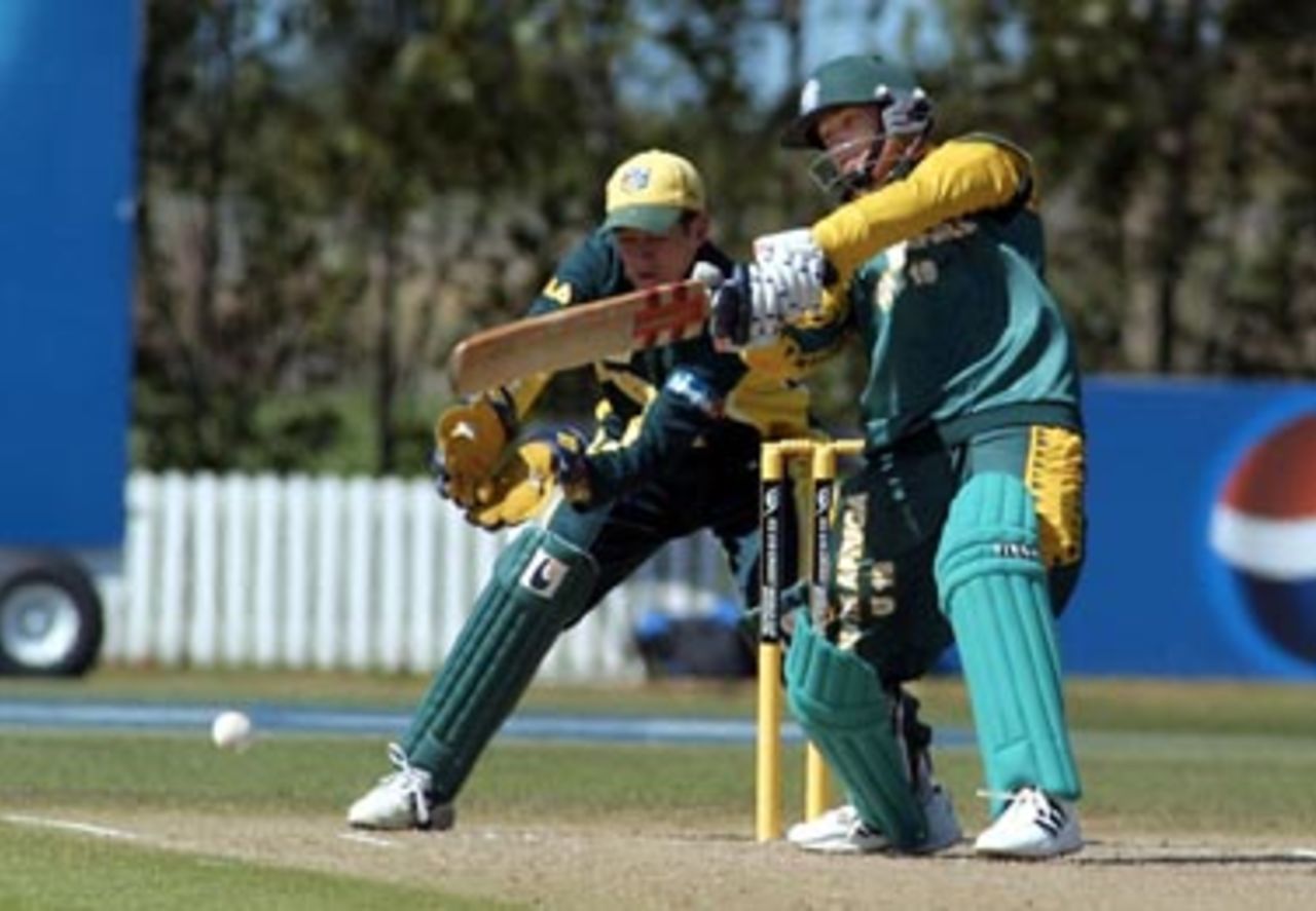 South Africa Under-19 batsman Greg Smith cuts a delivery from Australia Under-19 bowler Xavier Doherty during his innings of 51. ICC Under-19 World Cup Super League Final: Australia Under-19s v South Africa Under-19s at Bert Sutcliffe Oval, Lincoln, 9 February 2002.