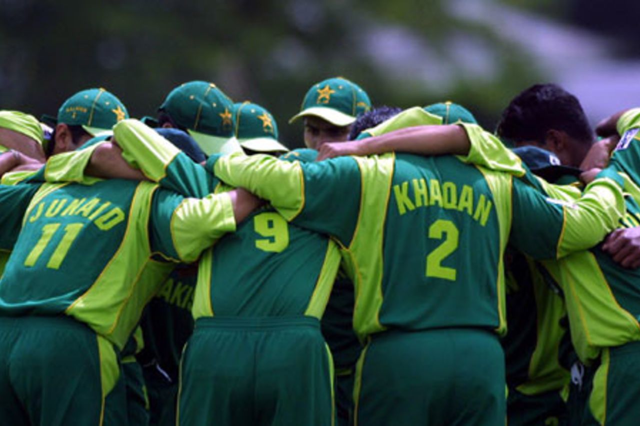 Pakistan Under-19 players huddle. ICC Under-19 World Cup Warmup: New Zealand Under-19s v Pakistan Under-19s at Lincoln No. 3, Lincoln, 17 January 2002.