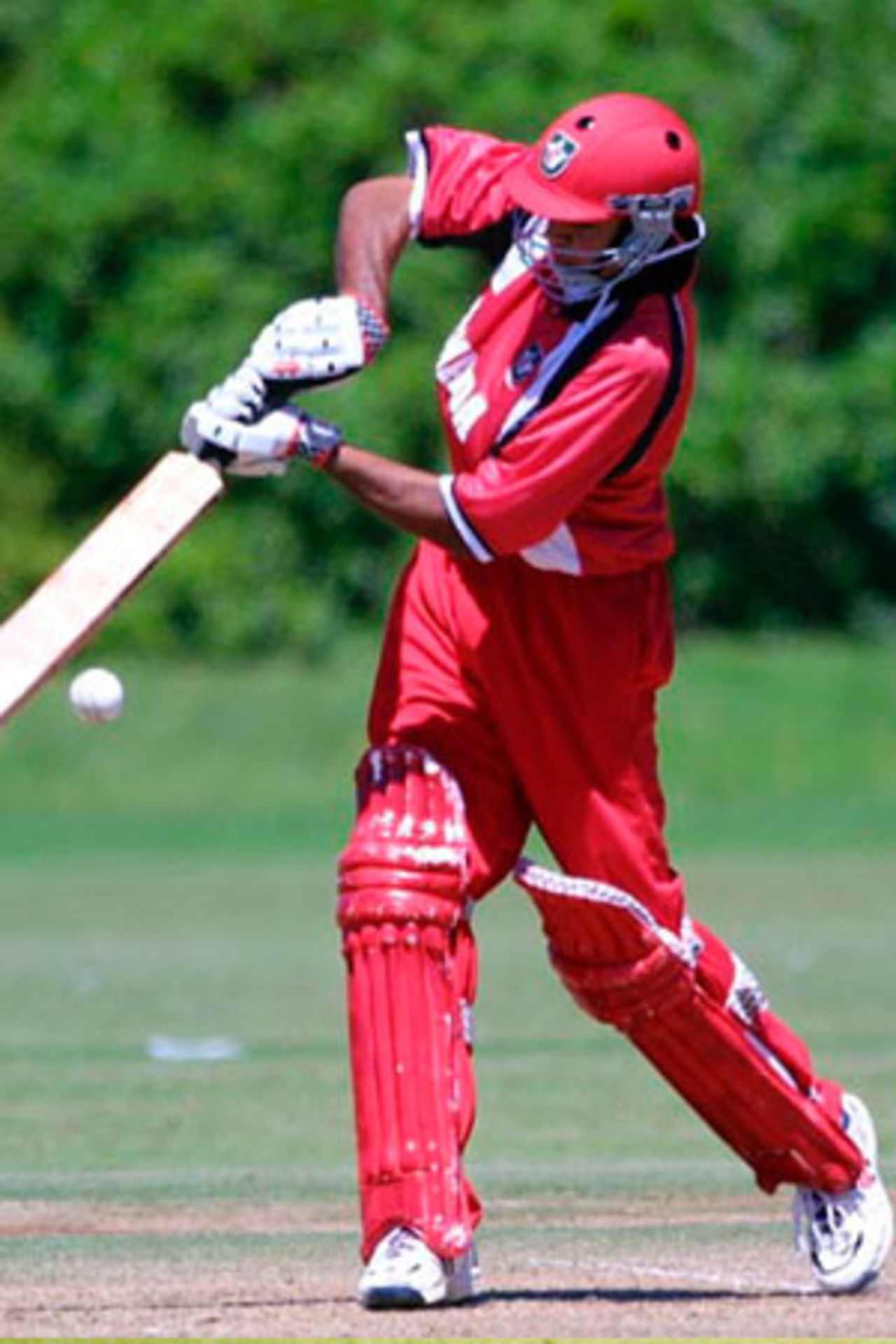 Canada Under-19 batsman Umar Bhatti drives a delivery on the off side during his innings of 33. ICC Under-19 World Cup Group A: Bangladesh Under-19s v Canada Under-19s at Colin Maiden Park, Auckland, 22 January 2002.