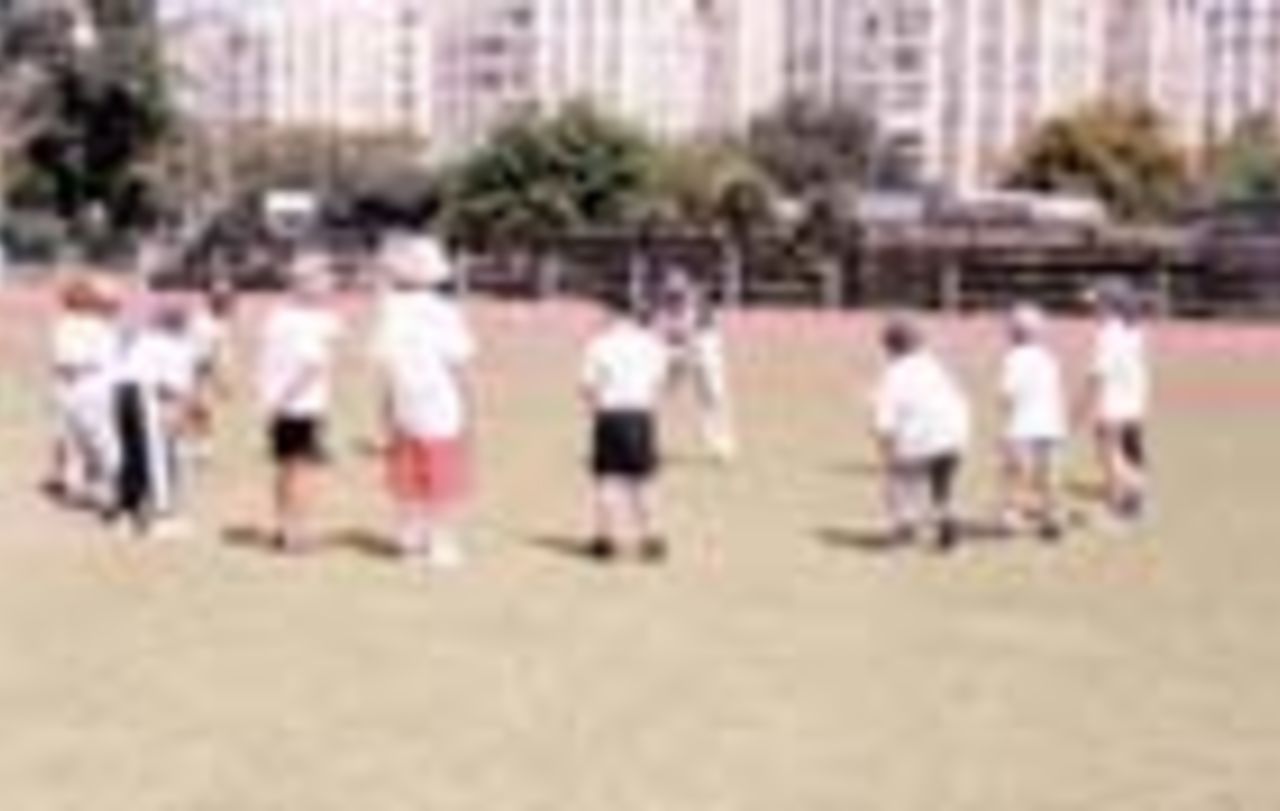 Cricket is taught once a week at a Tel Aviv primary school. Here, the team practices their catching prior to an ICA tournament.