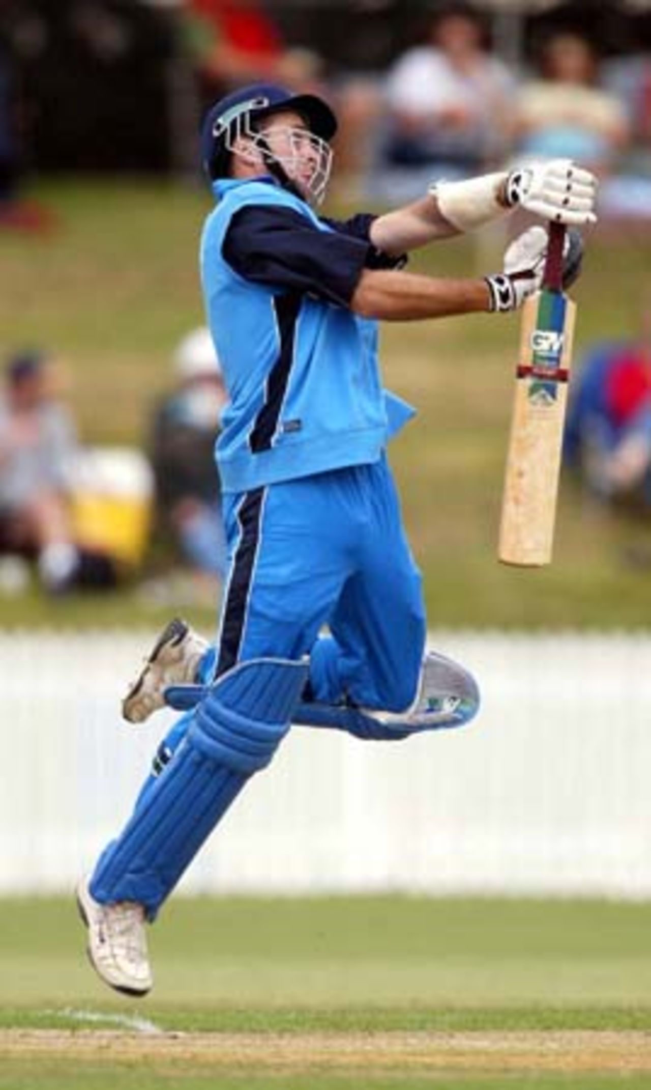 England batsman Michael Vaughan jumps to avoid a short delivery from Northern Districts bowler Ian Butler during his innings of 12. Tour match: Northern Districts v England at WestpacTrust Park, Hamilton, 8 February 2002.