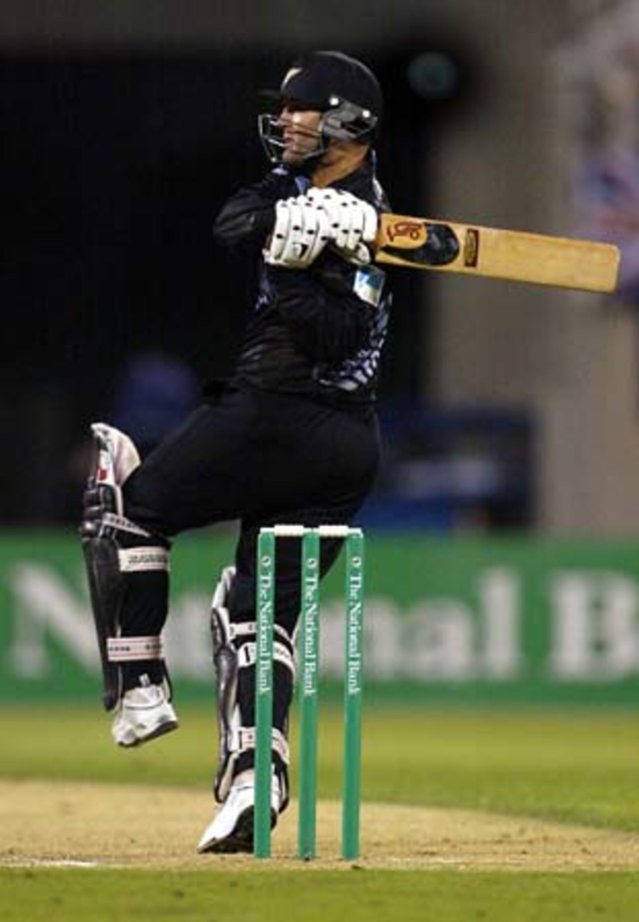 New Zealand batsman Nathan Astle pulls a delivery to the square leg boundary during his innings of 67 not out. 1st ODI: New Zealand v England at Jade Stadium, Christchurch, 13 February 2002.