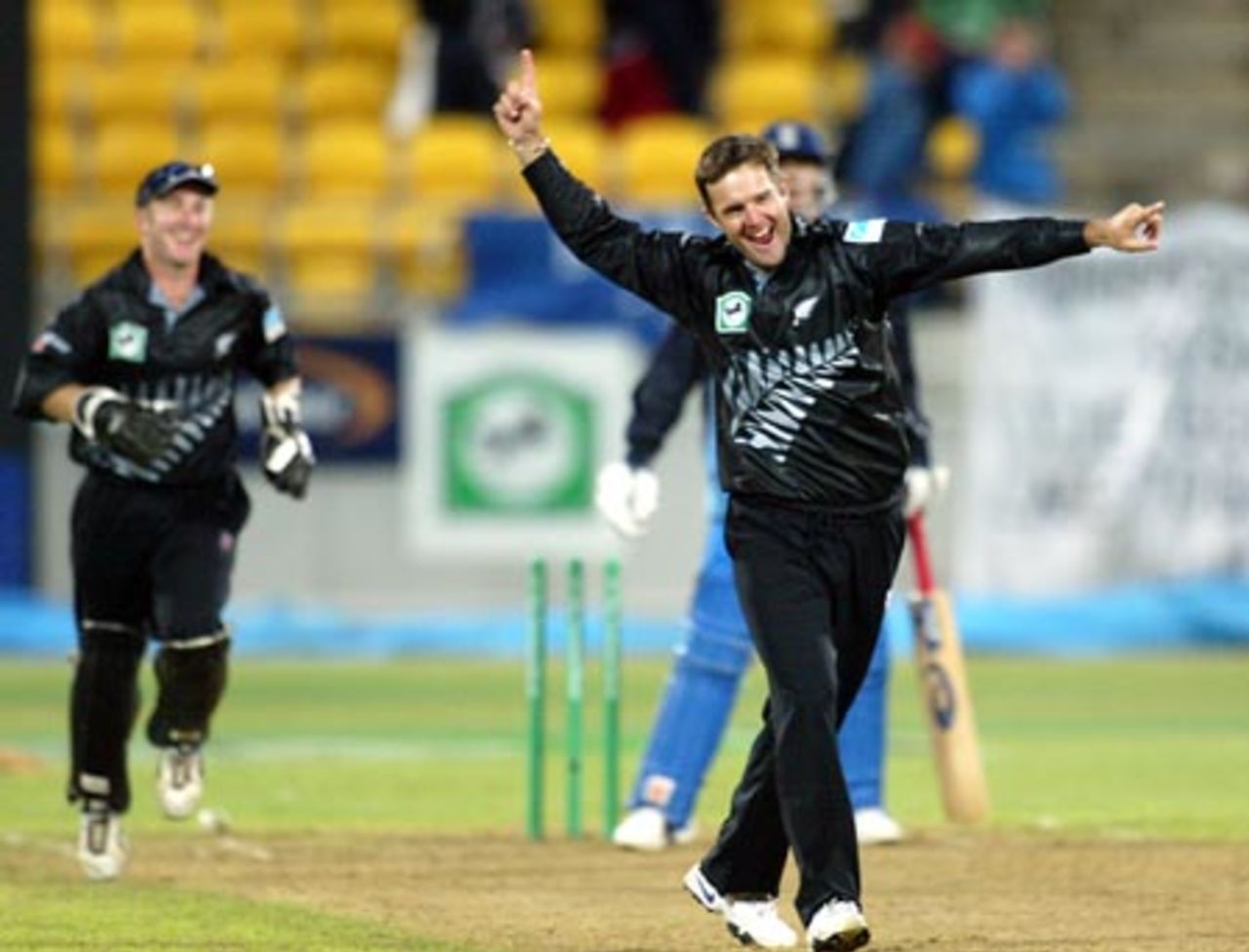 New Zealand bowler Nathan Astle celebrates the dismissal of England batsman Darren Gough, bowled for 0. Wicket-keeper Chris Nevin celebrates in the background. 2nd ODI: New Zealand v England at WestpacTrust Stadium, Wellington, 16 February 2002.