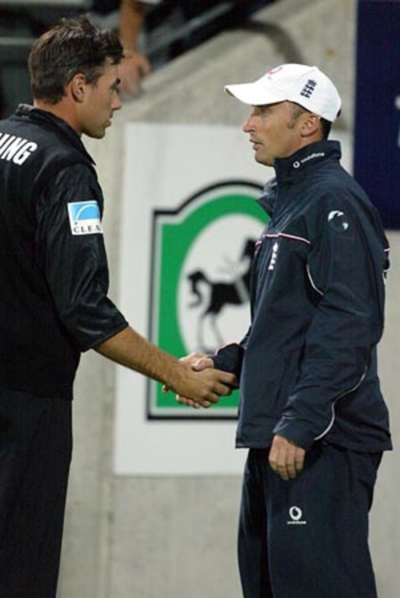 New Zealand captain Stephen Fleming and England captain Nasser Hussain shake hands at the end of the match after New Zealand won by 155 runs. 2nd ODI: New Zealand v England at WestpacTrust Stadium, Wellington, 16 February 2002.