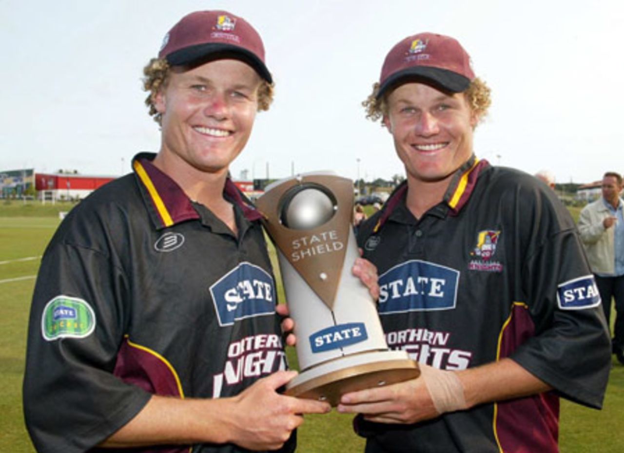 Players of the final James (left) and Hamish Marshall from Northern Districts hold the State Shield trophy. State Shield Final: Auckland v Northern Districts at North Harbour Stadium, Auckland, 1 February 2003.
