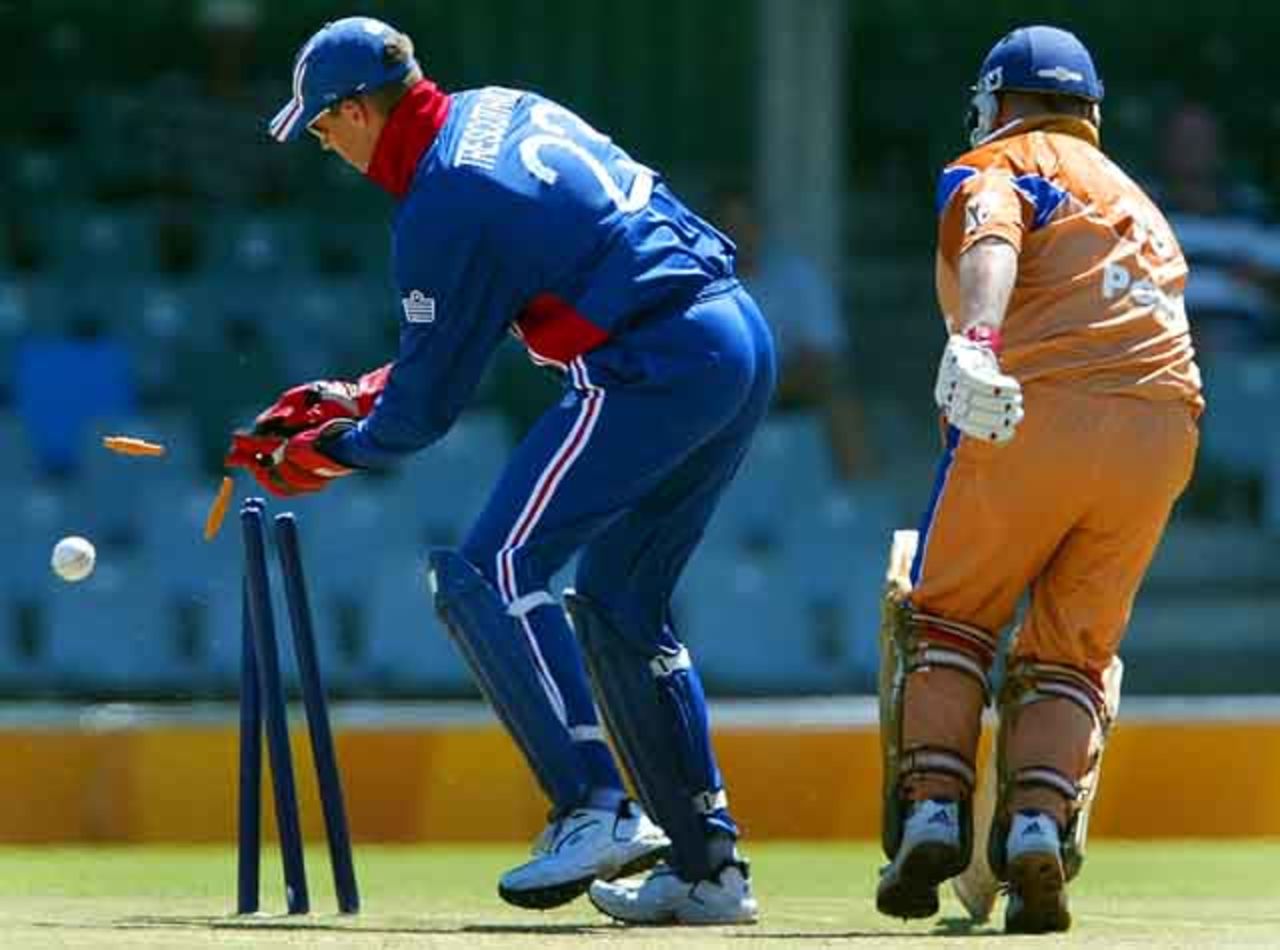 Border Bears Steven Pope survives a run out attempt from England's wicket keeper Marcus Trescothick during their World Cup warm up match against Border Bears at Buffalo Park in East London, South Africa, February 6, 2003.