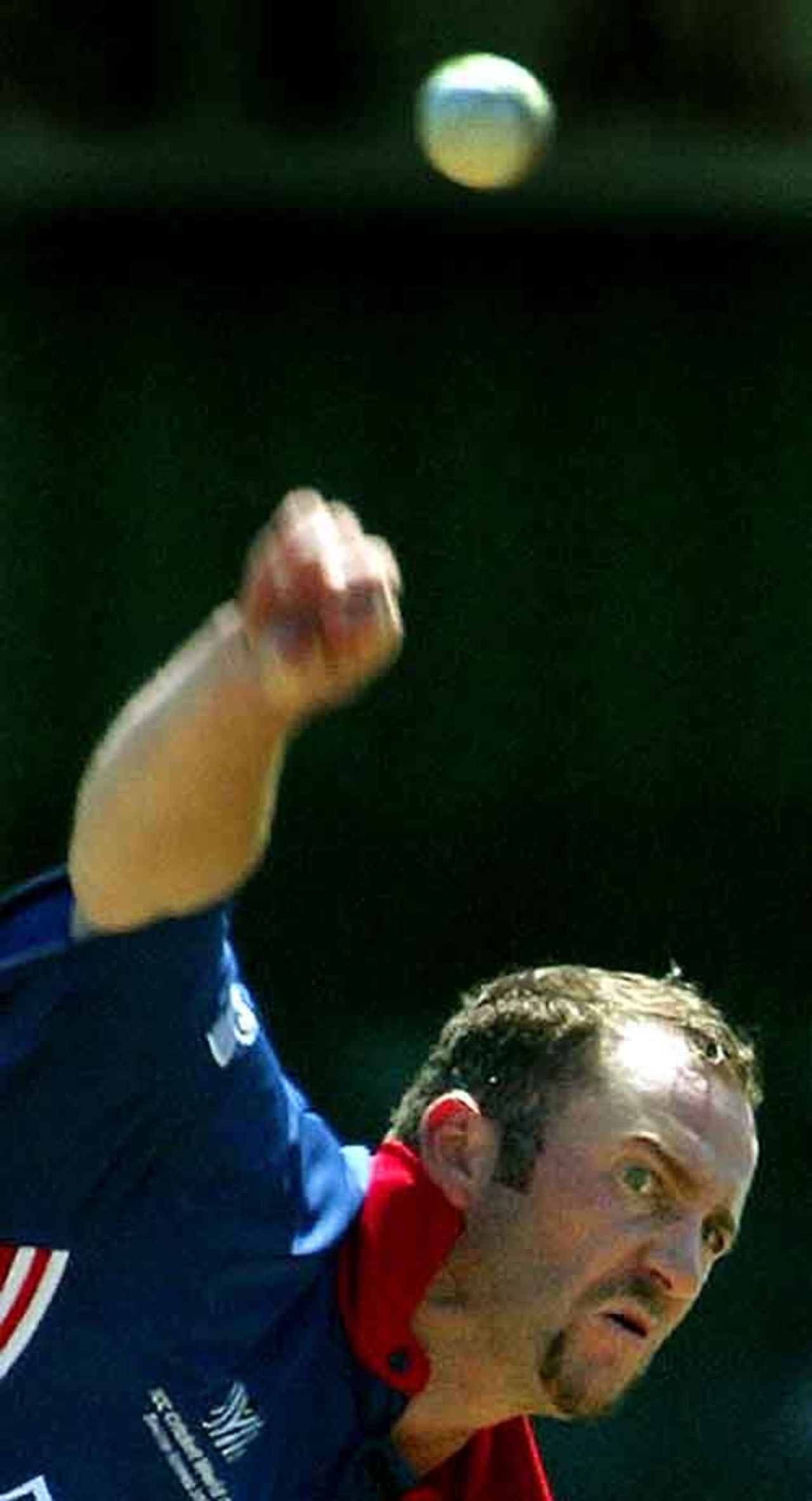 England's Craig White bowls, World Cup warm up match at Buffalo Park in East London, South Africa, February 6, 2003.
