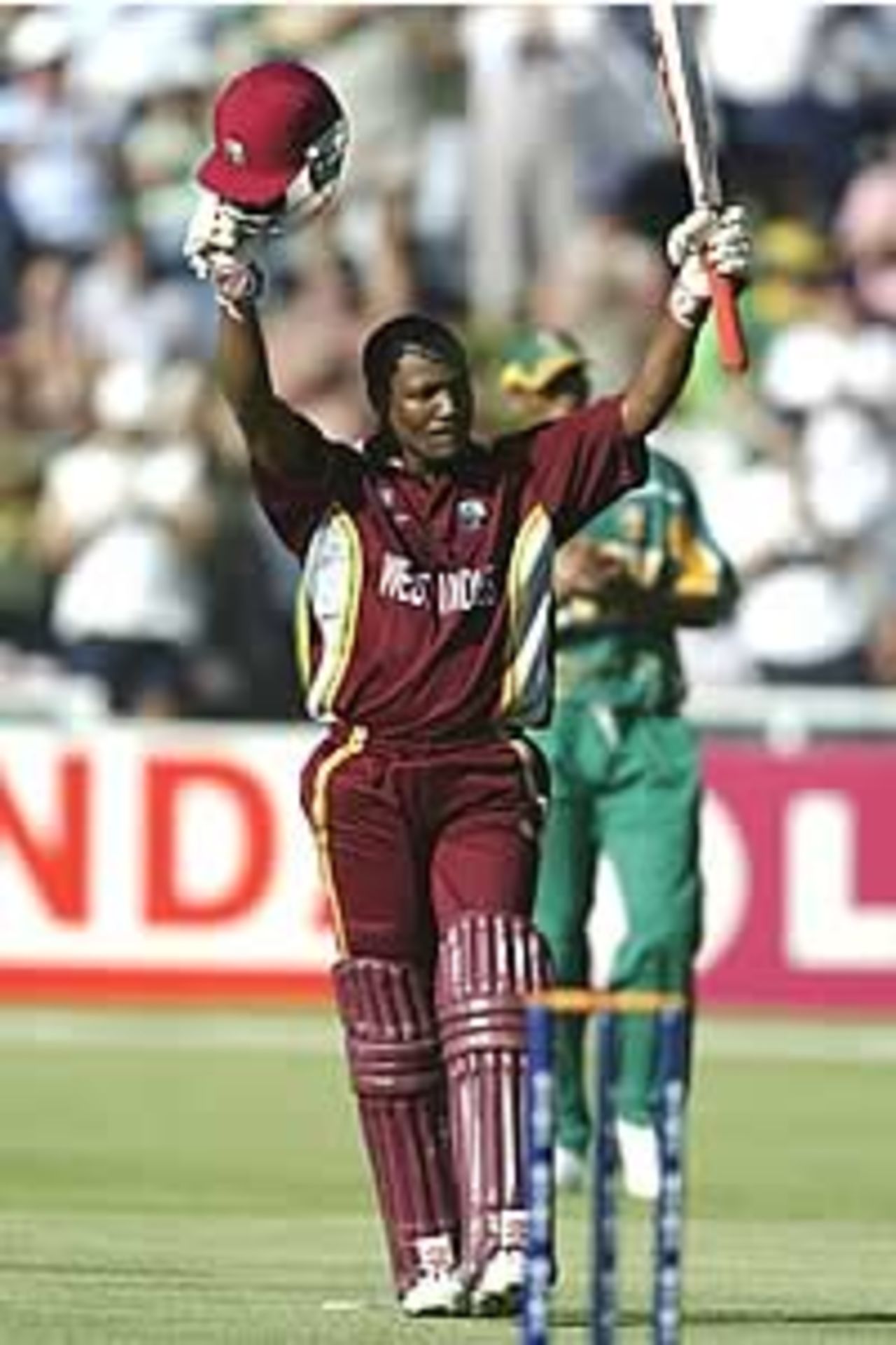 CAPE TOWN - FEBRUARY 9: Brian Lara of the West Indies celebrates his century during the ICC Cricket World Cup Opening match between South Africa and the West Indies played at the Newlands Cricket Ground on February 9, 2003 in Cape Town, South Africa.