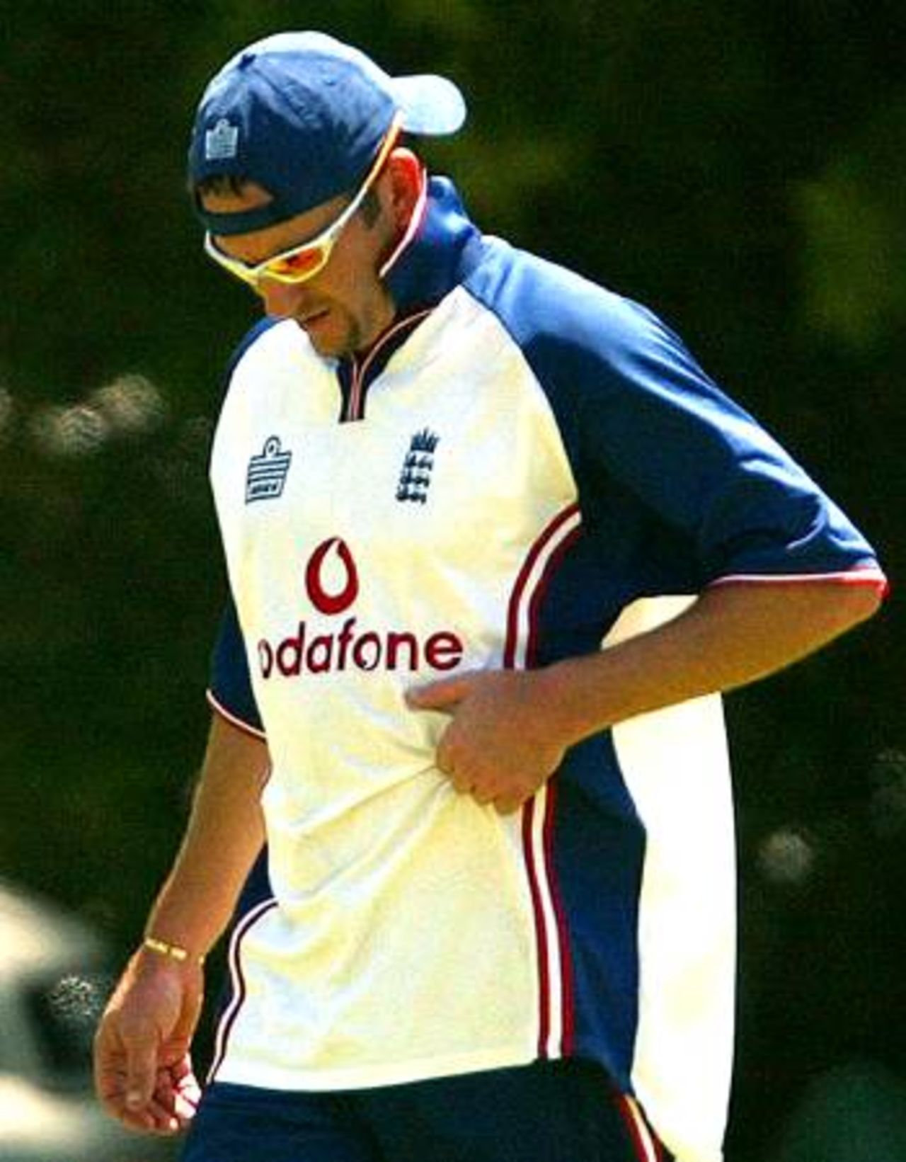Craig White grips his side during a nets session in Cape Town, South Africa